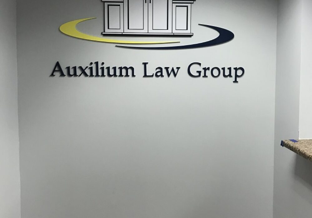 Removal and Re-installation of Auxilium Law Group’s Lobby Sign