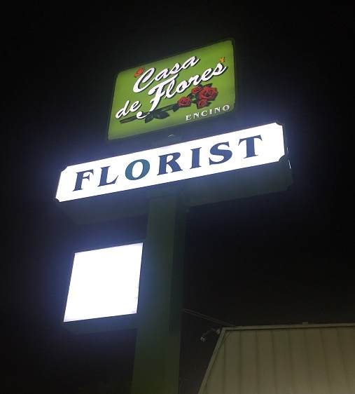 You are currently viewing Night View of Casa de Flores Illuminated Sign in Encino