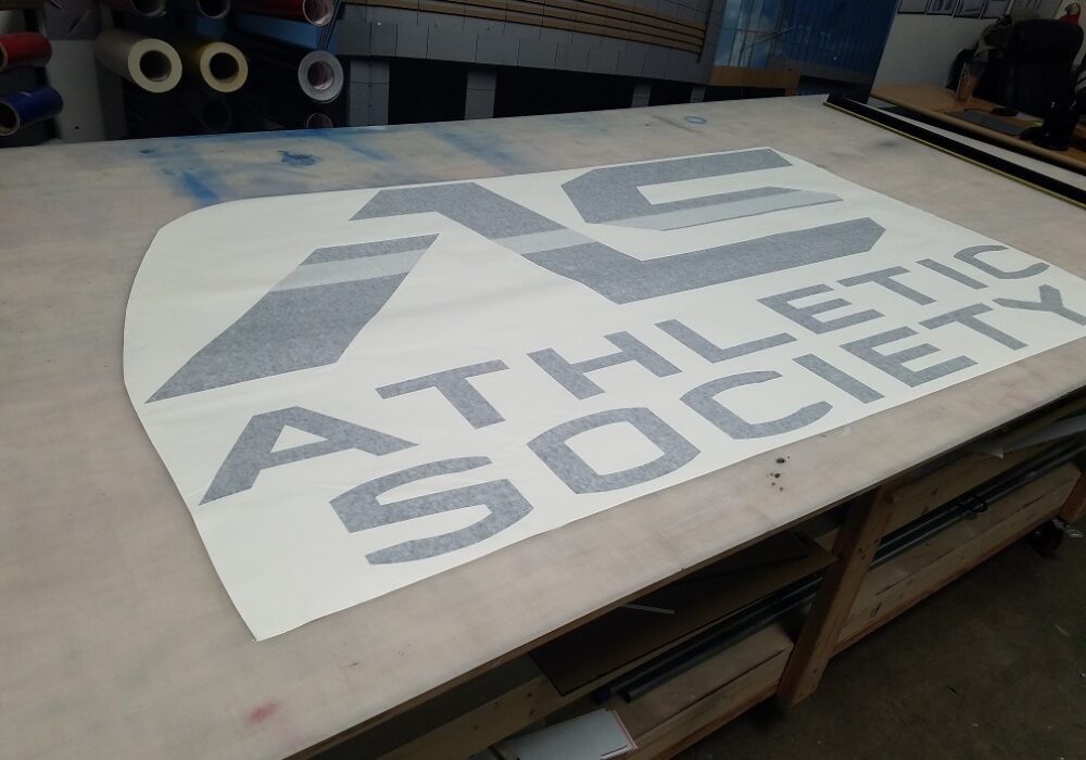 Making  New Light Box Inserts for Athletic Society in Thousand Oaks