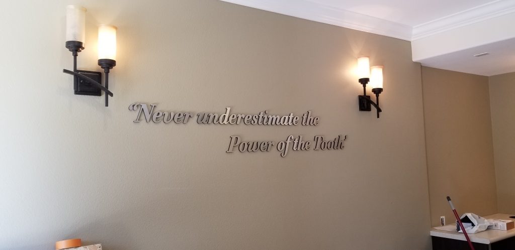 Inspiring words can decorate a lobby, brighten days and also complimenting the centerpiece. Like this dentist clinic lobby sign for Glendora Oral Surgery.