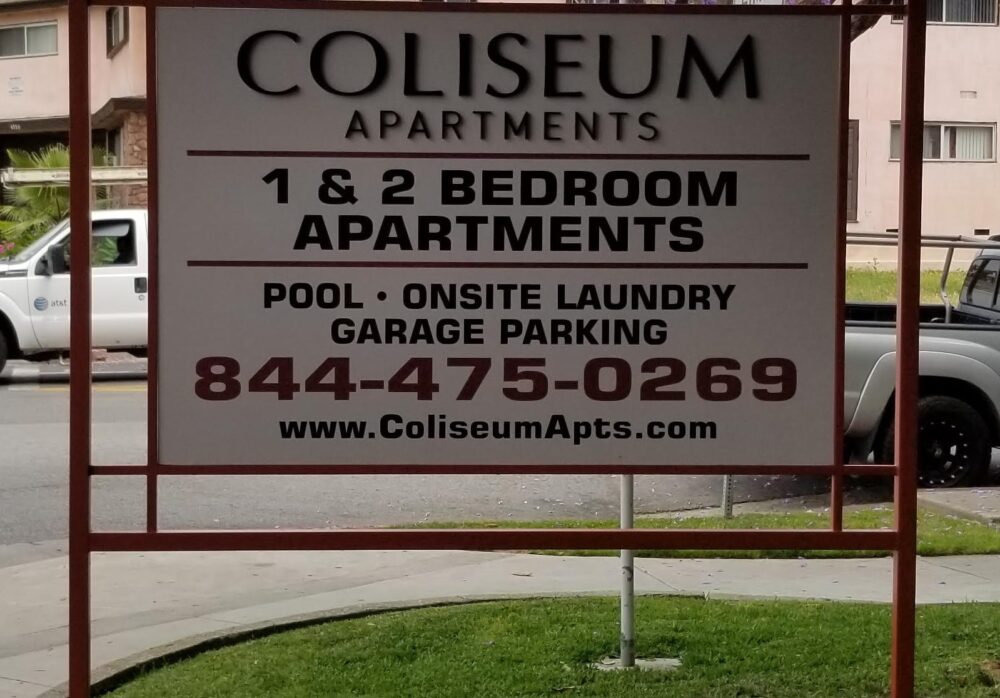 Monument Post and Panel Sign for Coliseum Apartments in Los Angeles