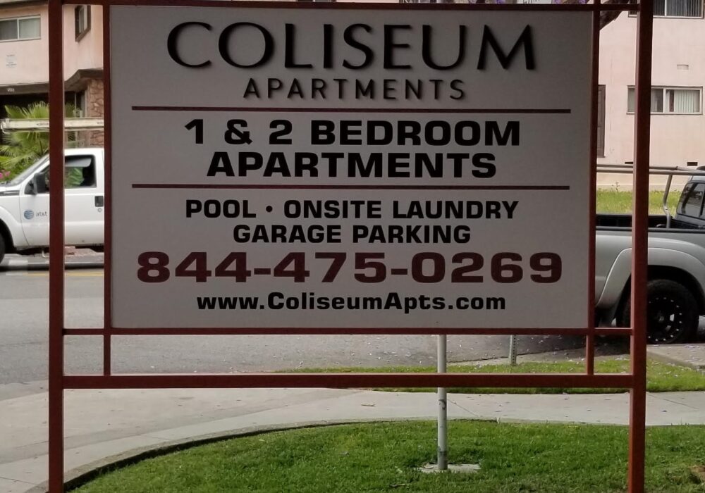 Monument Post and Panel Sign for Coliseum Apartments in Los Angeles