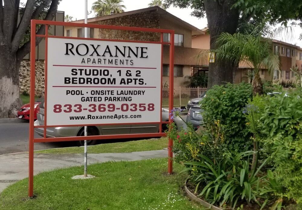 Apartment Post and Panel Sign for Roxanne Apartments in Los Angeles