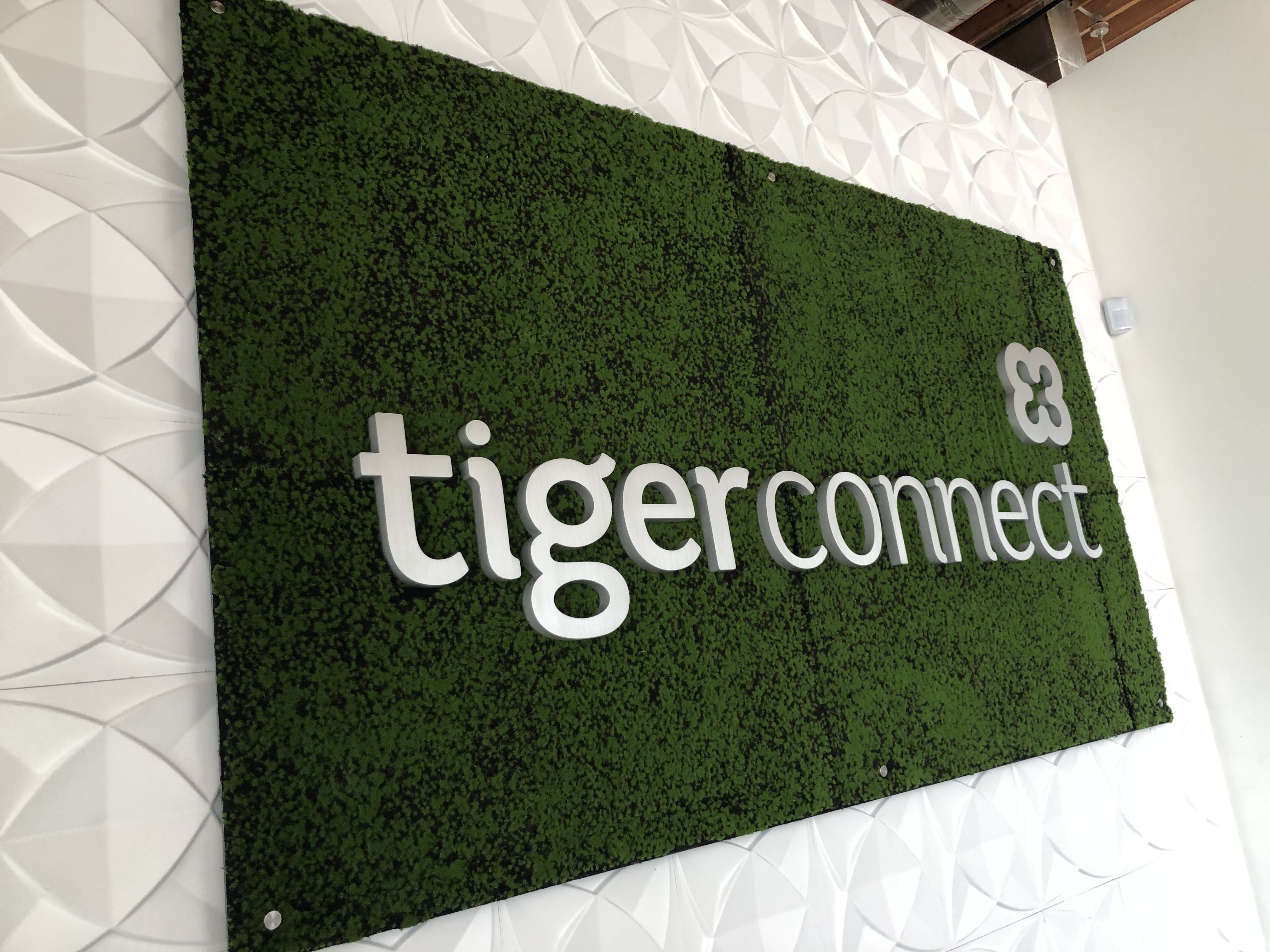 This lobby sign project included prismatic background wallpaper. So now Tiger Connect's Santa Monica office looks complete!