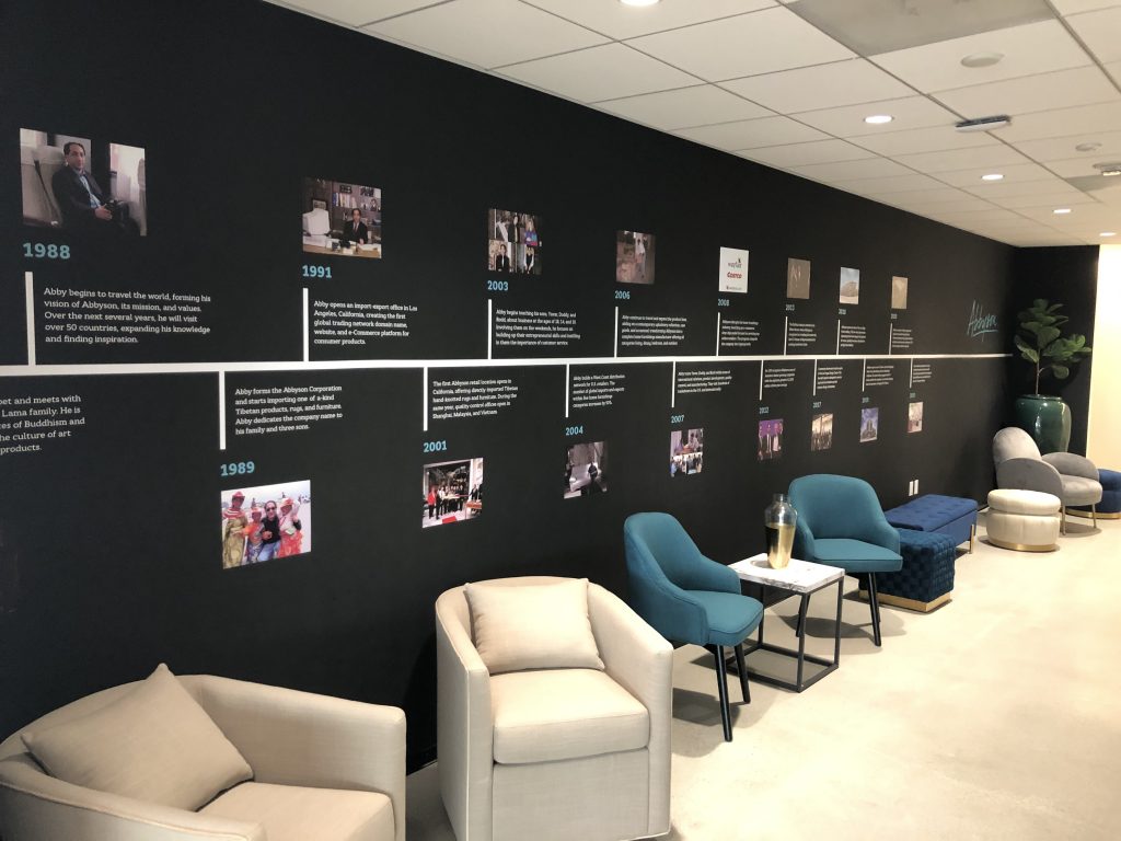 We often mention conveying brand identity through signage. Timeline wall graphics are a great way to do this, like with Abbyson's office in Woodland Hills.