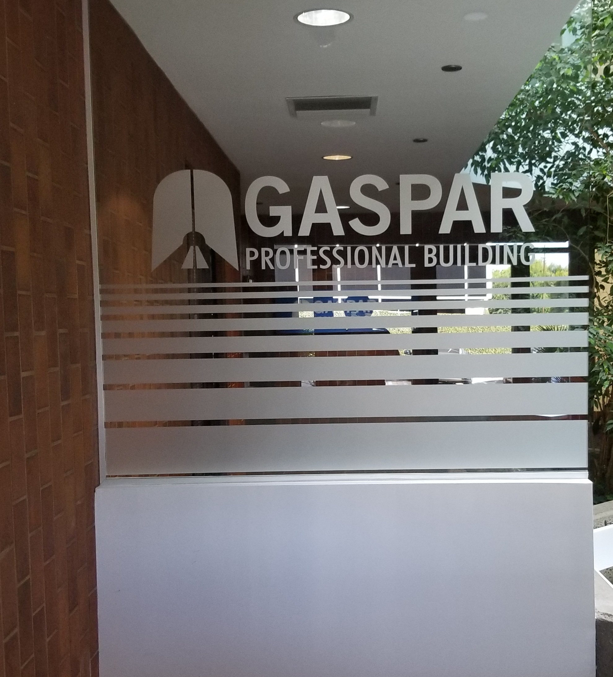 Make your lobby desk presentable with signage. Like this etched vinyl office window graphics for Gaspar Insurance in Woodland Hills.