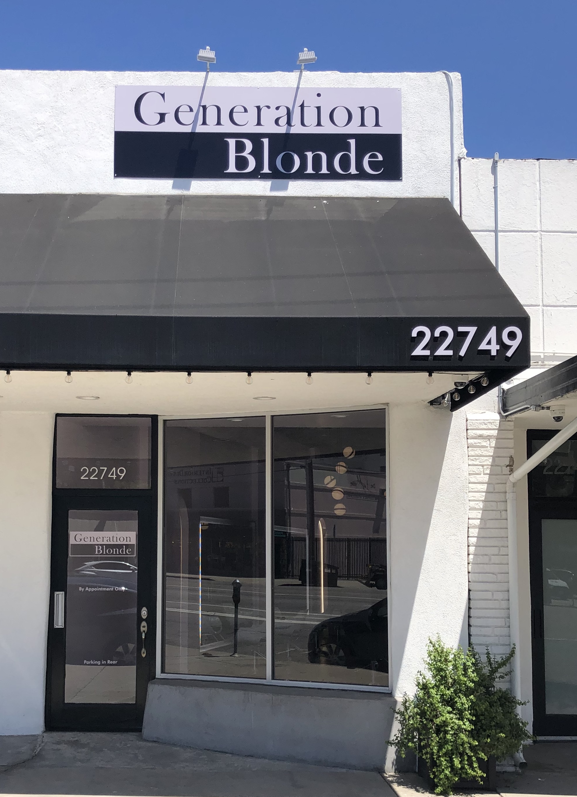The custom storefront sign we made for the storefront of Generation Blonde in Woodland Hills as part of a larger business sign package.