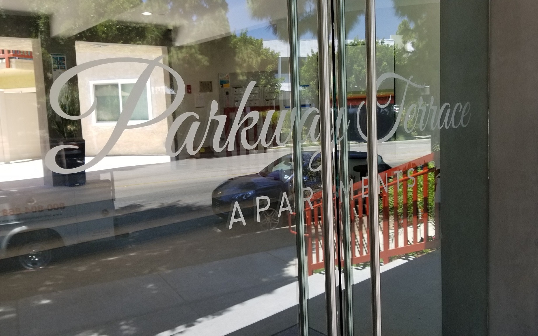 Our etched glass vinyl entrance sign for Parkway Terrace in Culver City. So the apartment will look more welcoming for potential tenants