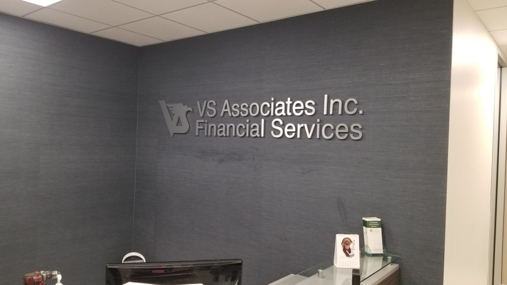Offices should look their best to make a great first impression on clients.  Like this investment firm lobby sign for VS Associates.