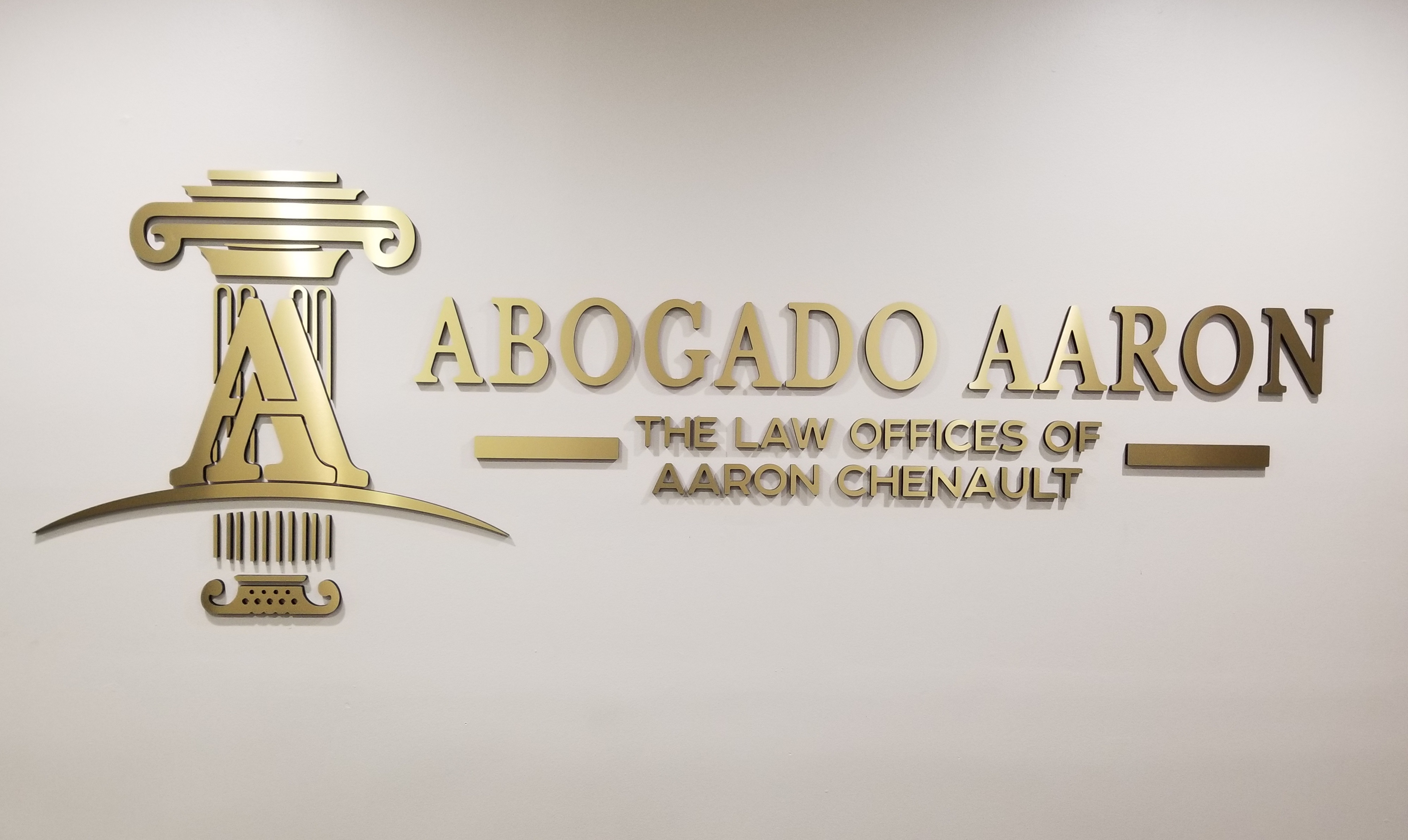 The impressive law office lobby sign we made and installed for Abogado Aaron's Los Angeles branch, conveying the caliber of legal services they provide.