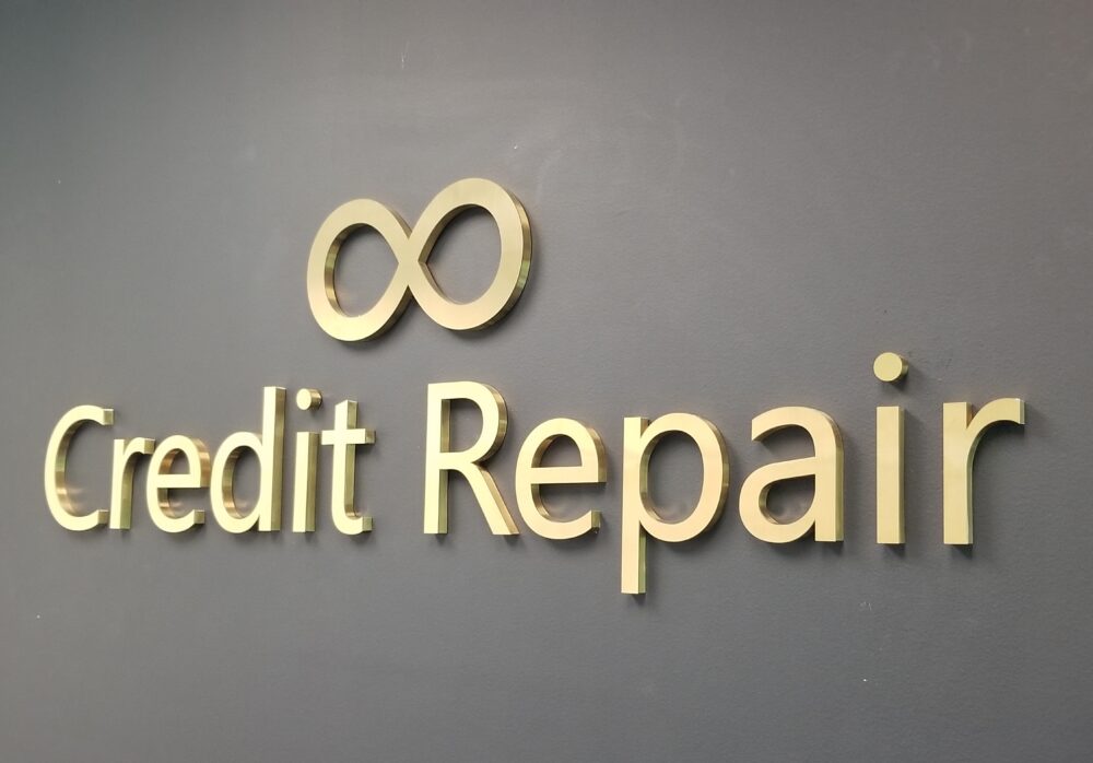 Metal Office Lobby Sign for Unlimited Credit Repair in Woodland Hills