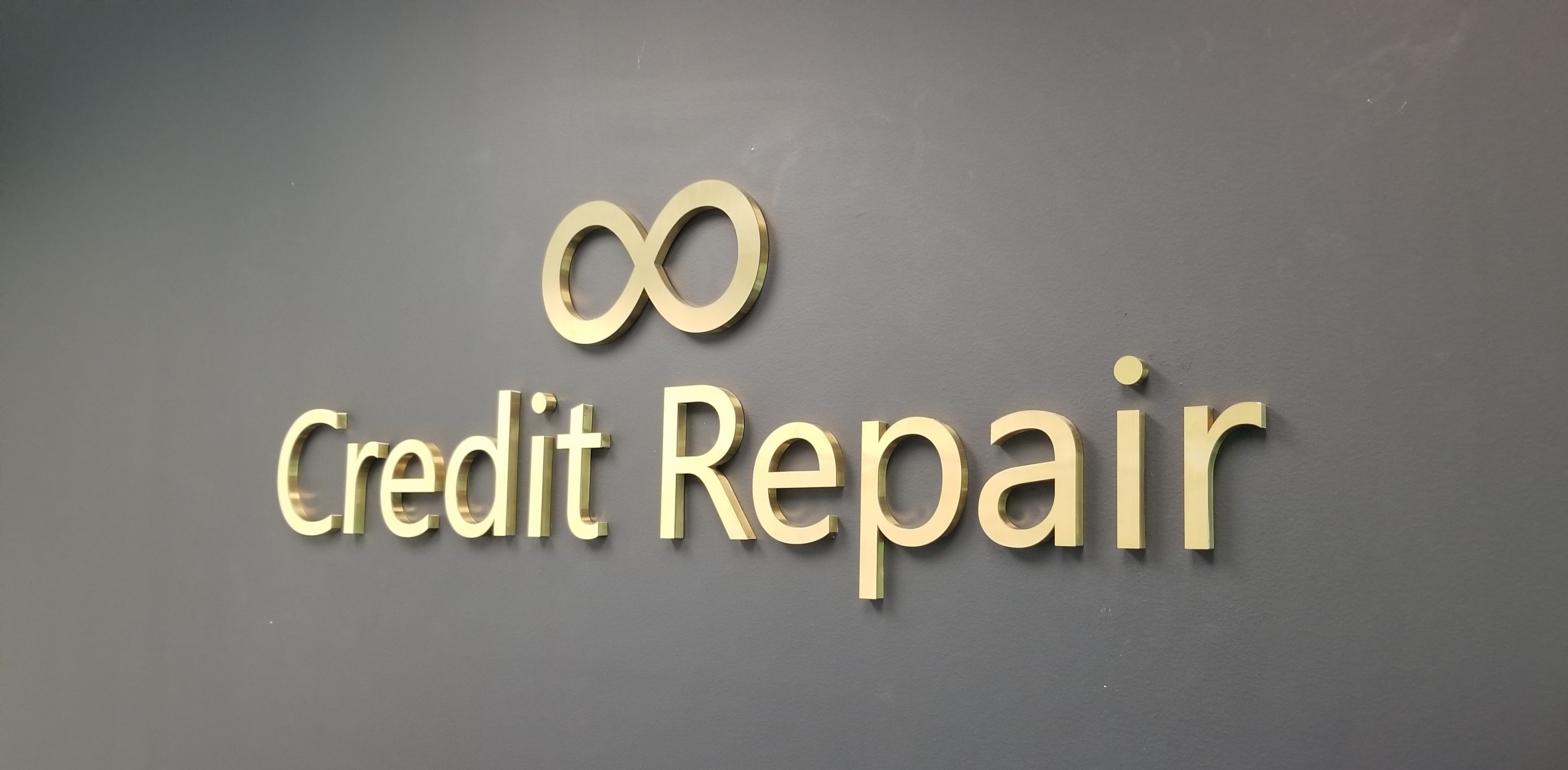 This is the metal office lobby sign we made for Unlimited Credit Repair in Woodland Hills.