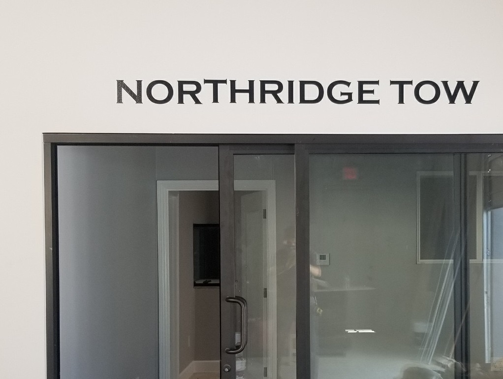Our work for Northridge Auto Service continues. This time it is indoor office signage, specifically a wall graphics business sign package.