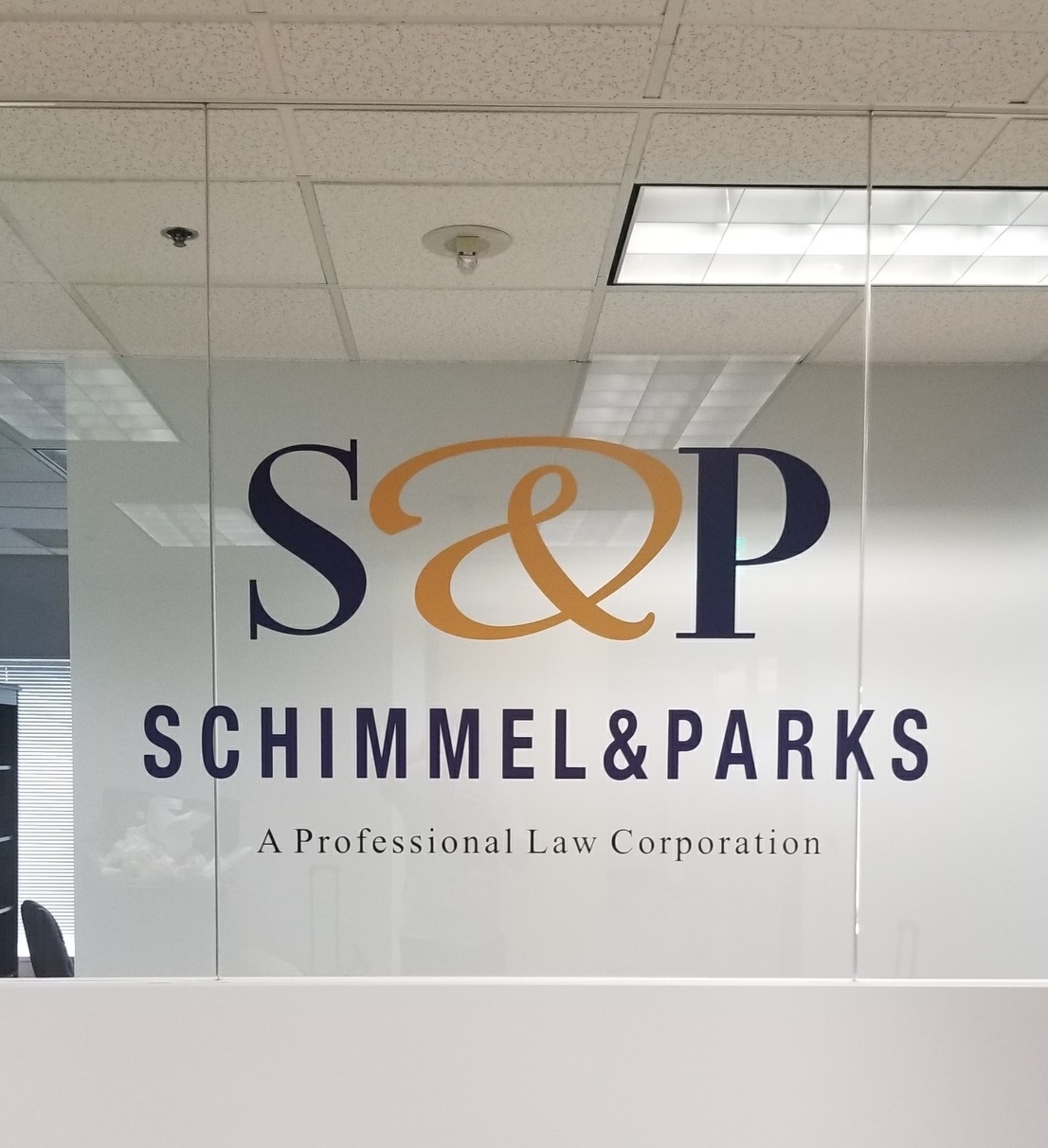 Office lobby window graphics for Schimmel and Parks. With this signage, the Sherman Oaks law firm's reception area looks absolutely fetching. 