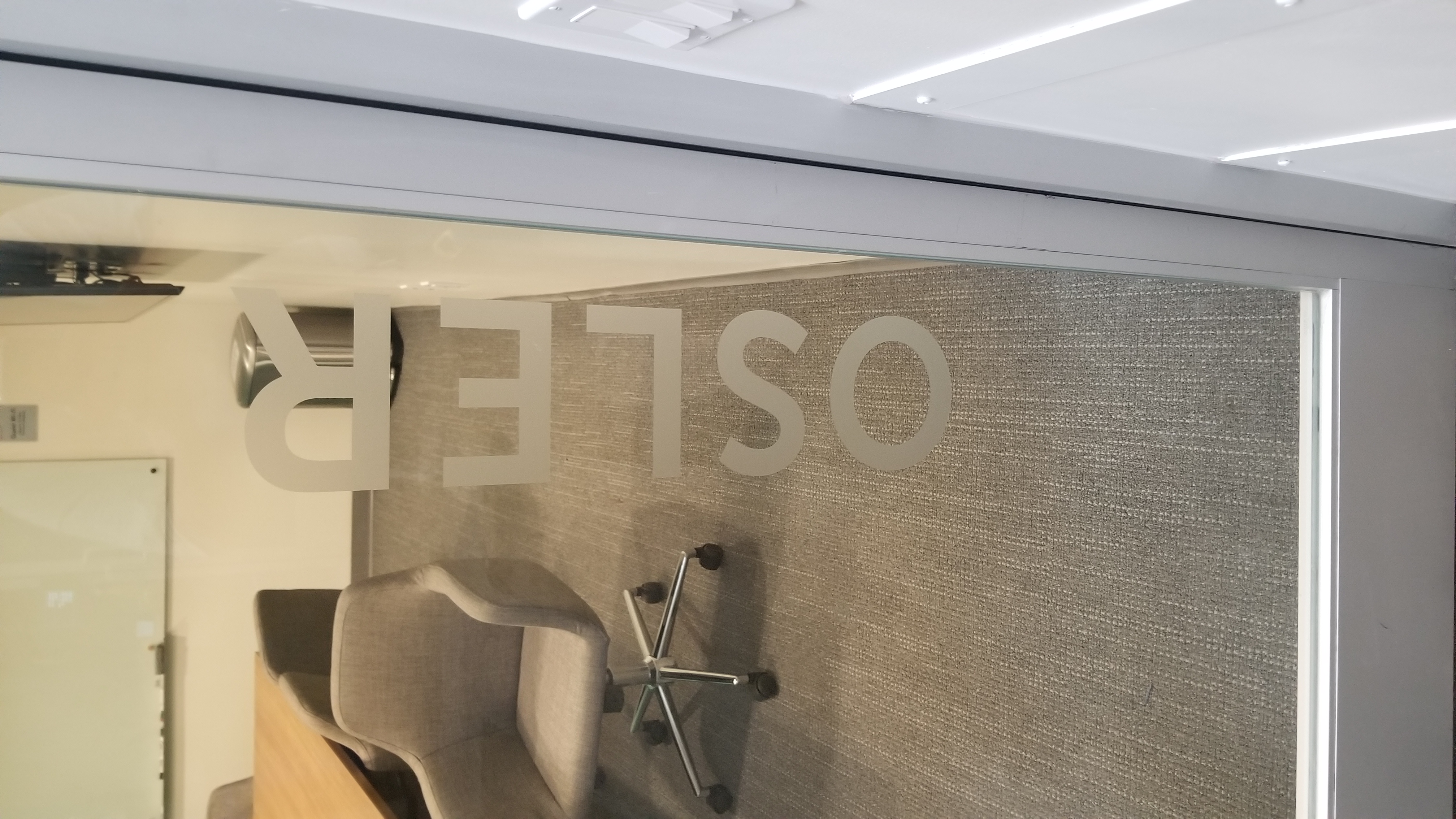 A part of the Office Design Package for Tiger Connect in Santa Monica. The frosted glass vinyl names each conference room after a famous medical pioneers.