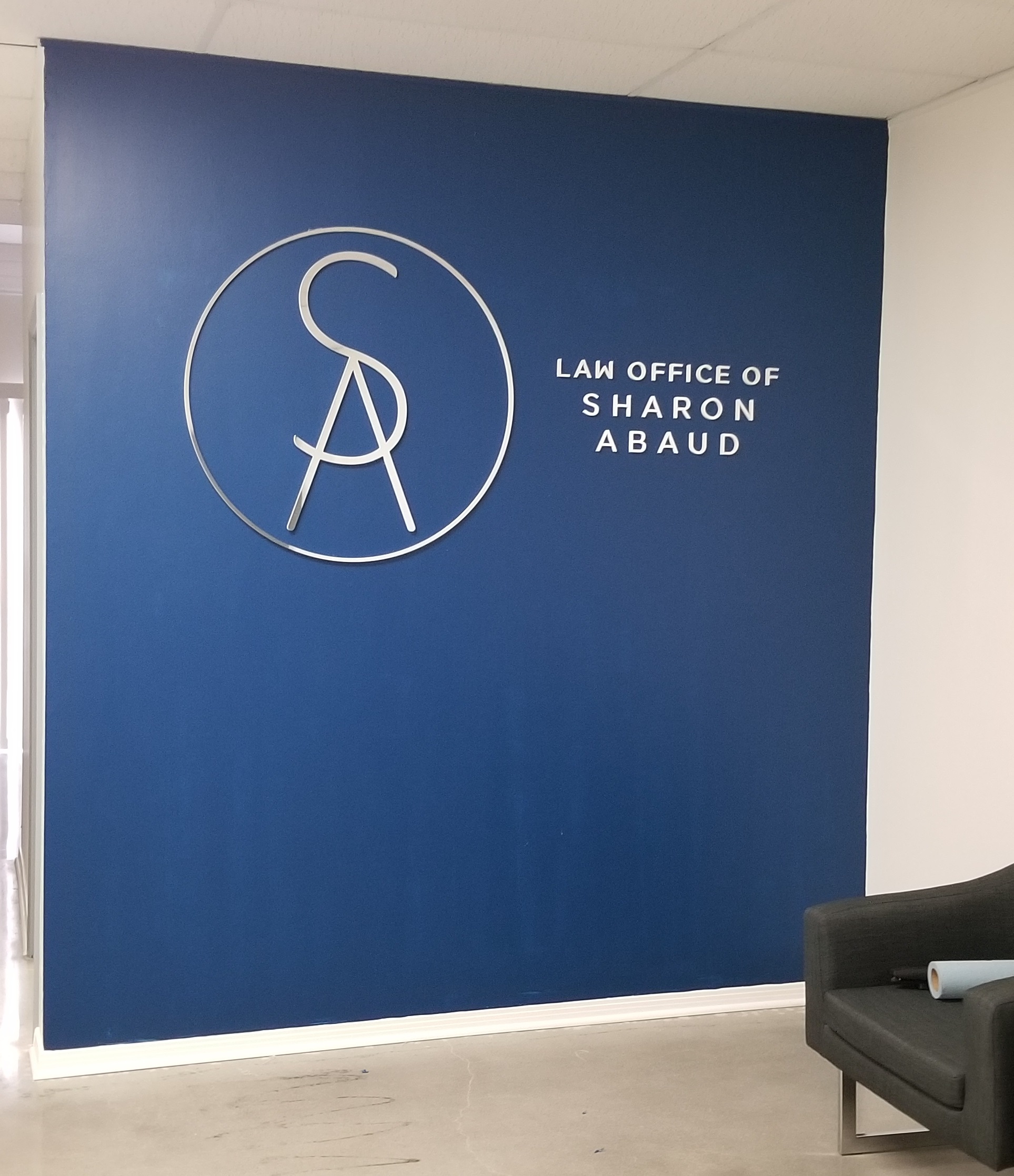This is the laser-cut acrylic lobby sign we made for the Torrance law office of immigration lawyer Sharon Abaud.