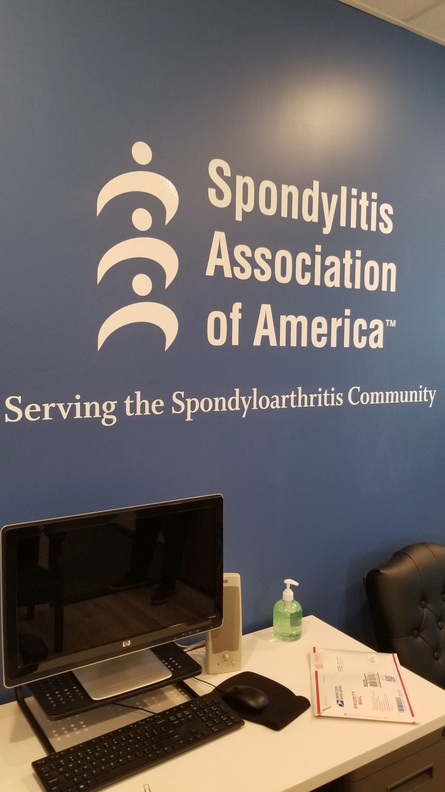 These are the wall graphics lobby sign for Spondylitis Association of America. With this, the Ventura nonprofit's office looks even more visually impressive.