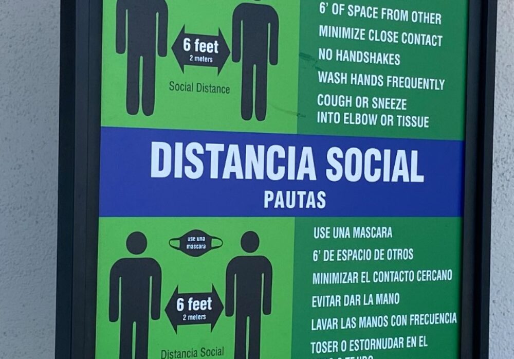 Bilingual Sign with Social Distancing Guidelines in English and Spanish