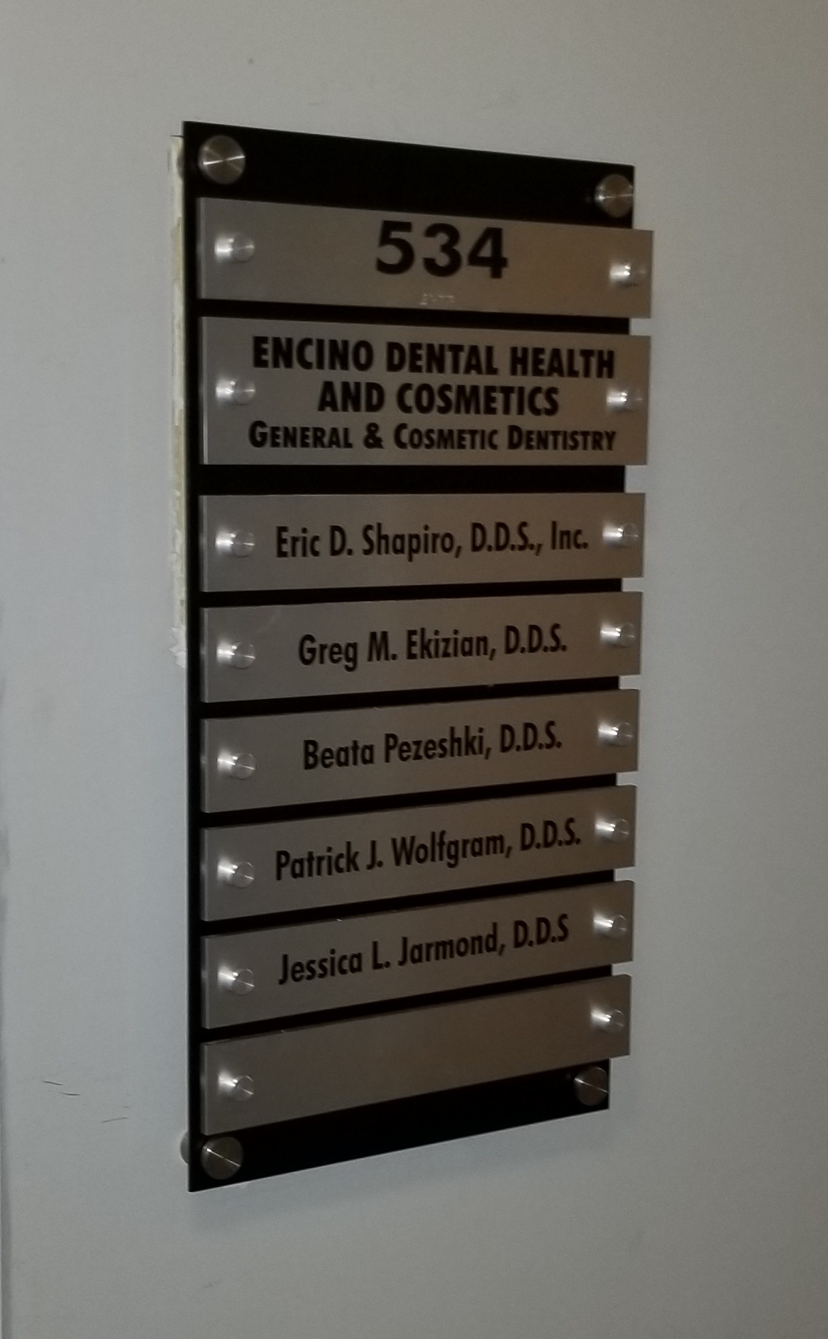 We fabricated and installed this directory suite plaque with changeable doctor names for Ethan Christopher Property Management's Encino location.
