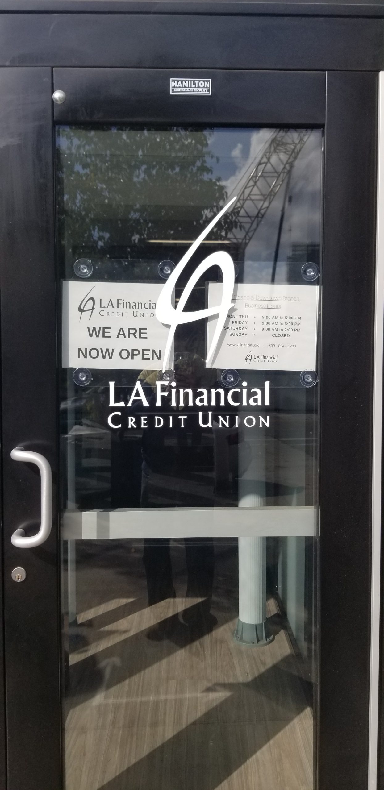 More from the comprehensive sign package for LA Financial. These are cut vinyl window graphics for their entrance.