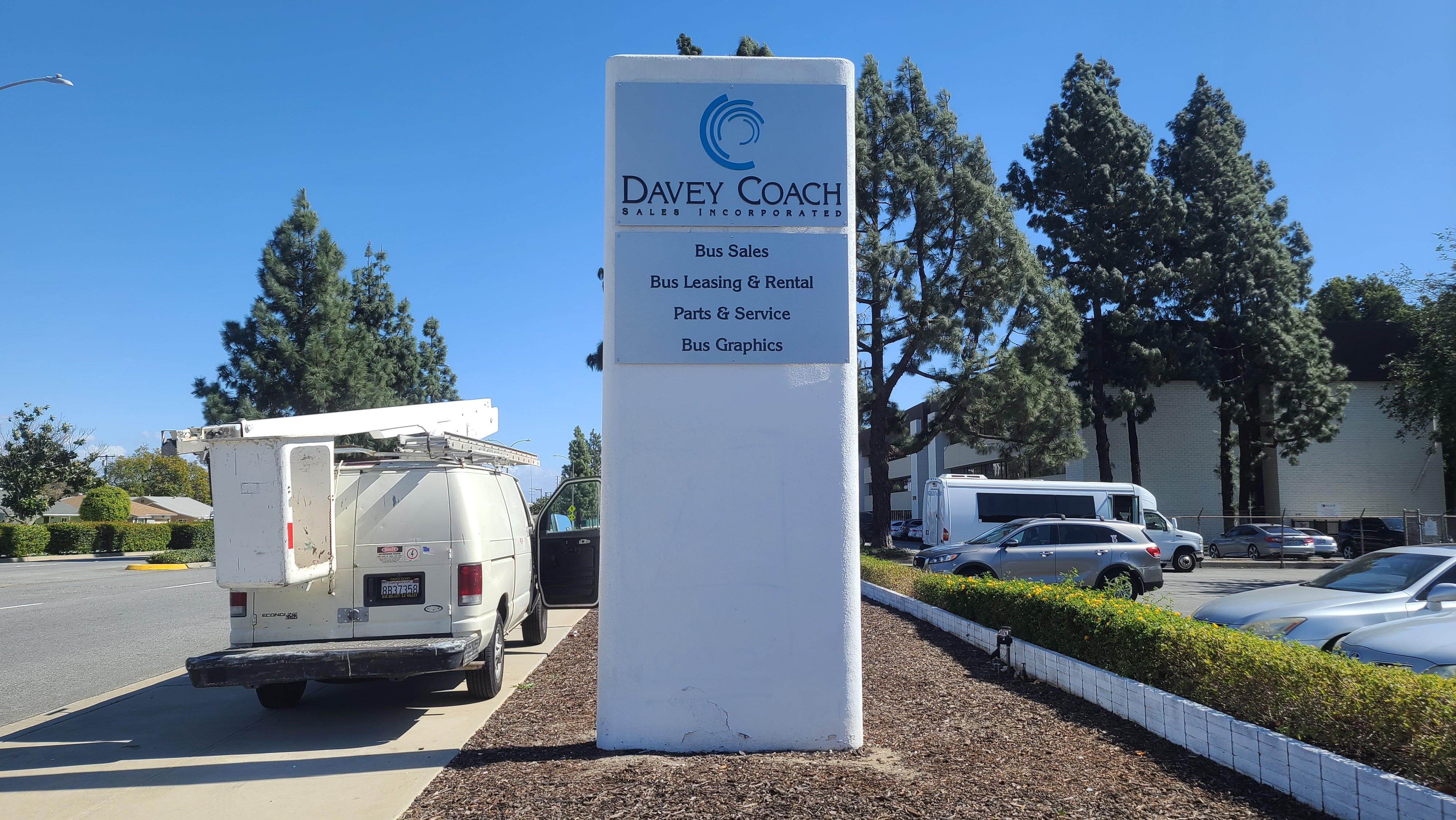 Dimensional letters business sign package for Davey Coach's Norwalk establishment.