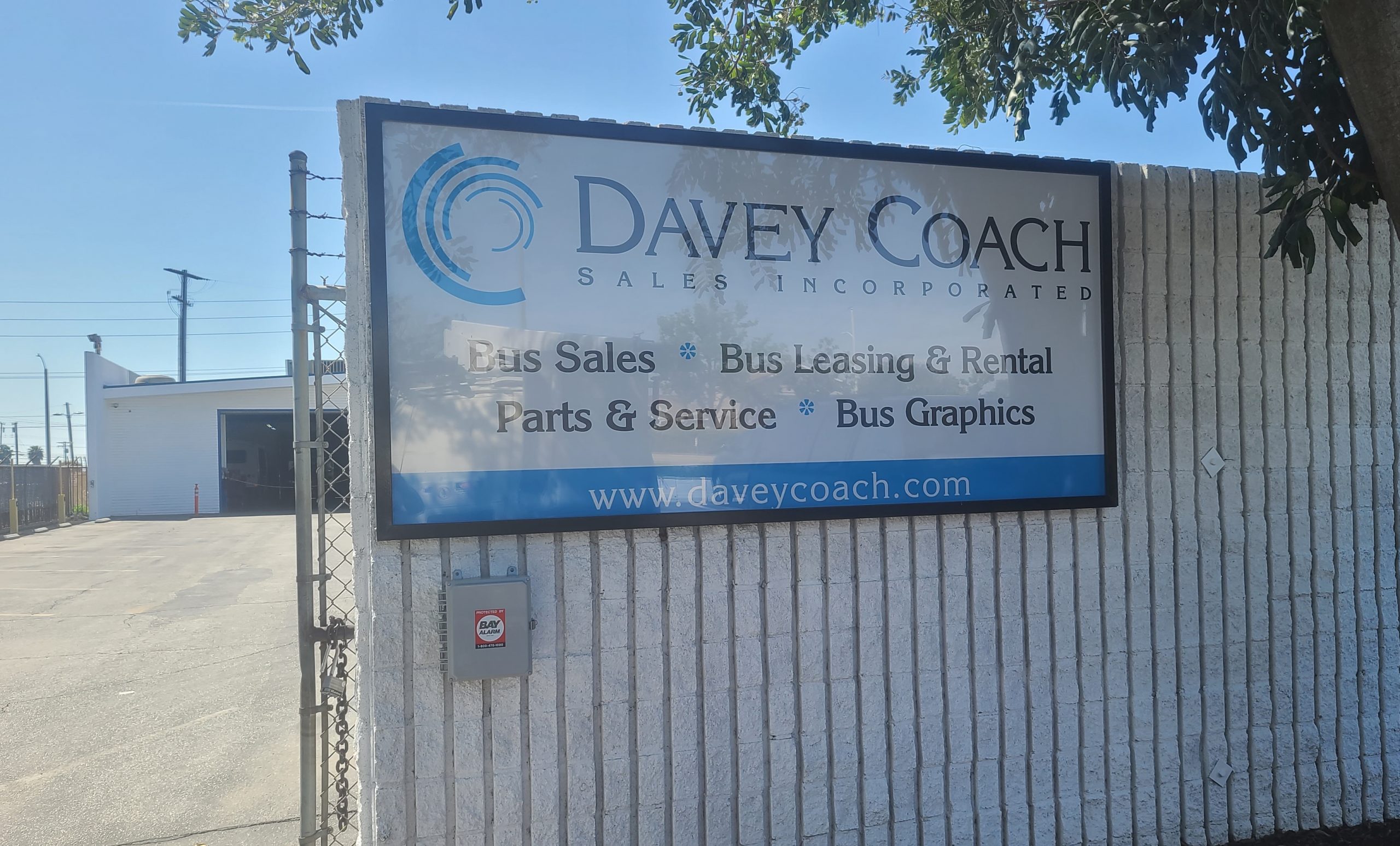 ﻿Additional signage for Davey Coach in Norwalk as part of their custom metal business sign package. And window graphics as well.