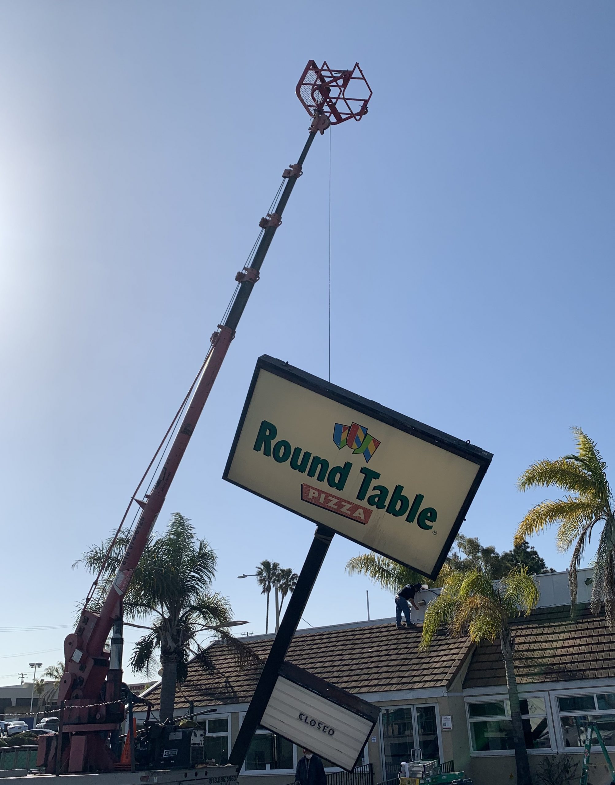 We removed Round Table Pizza's giant pole sign for Sketchers' world headquarters. Who better to provide sign removal service than a sign company?