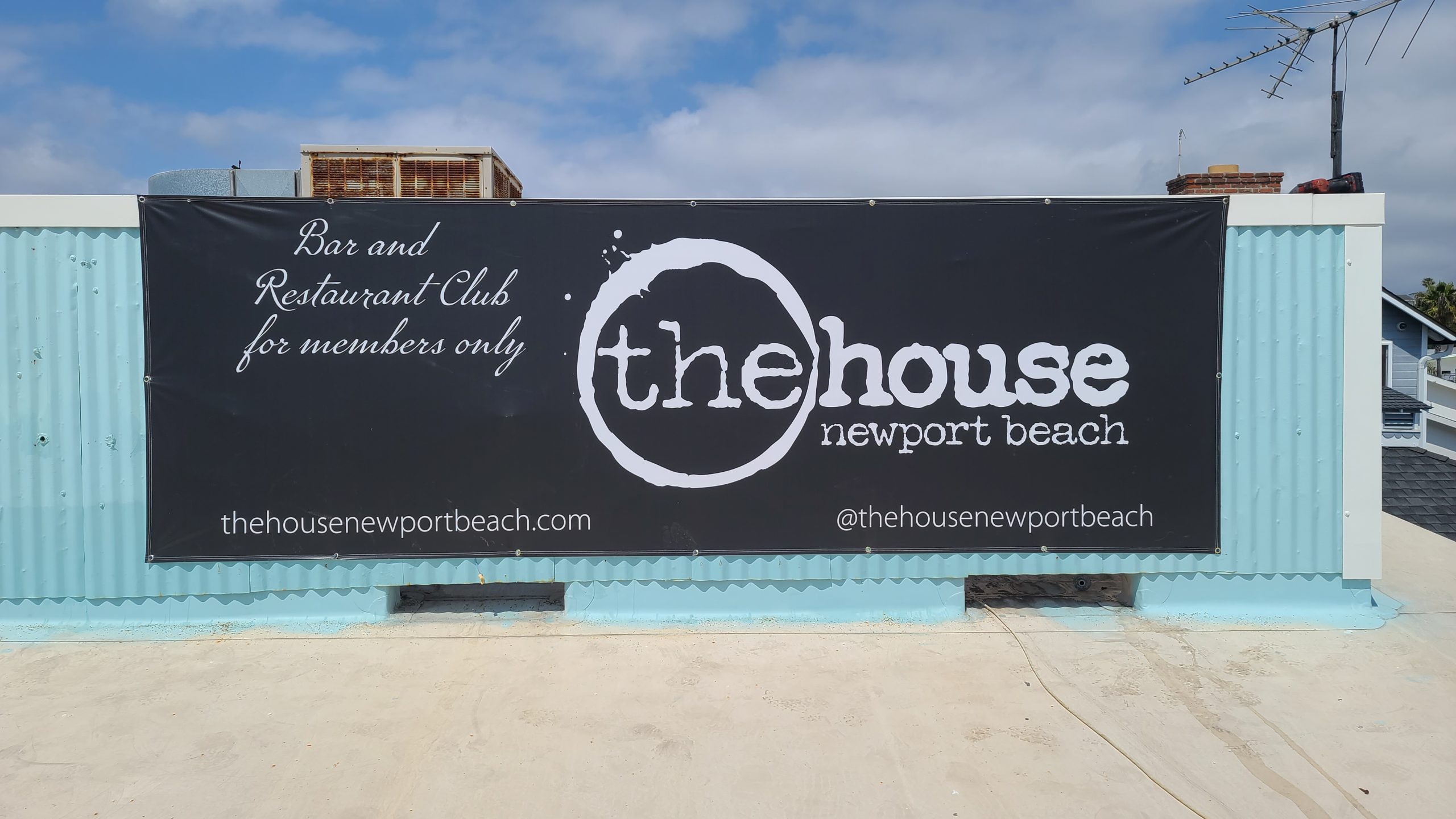 This is our exterior custom banner for The House Newport Beach, part of their restaurant banner sign package.