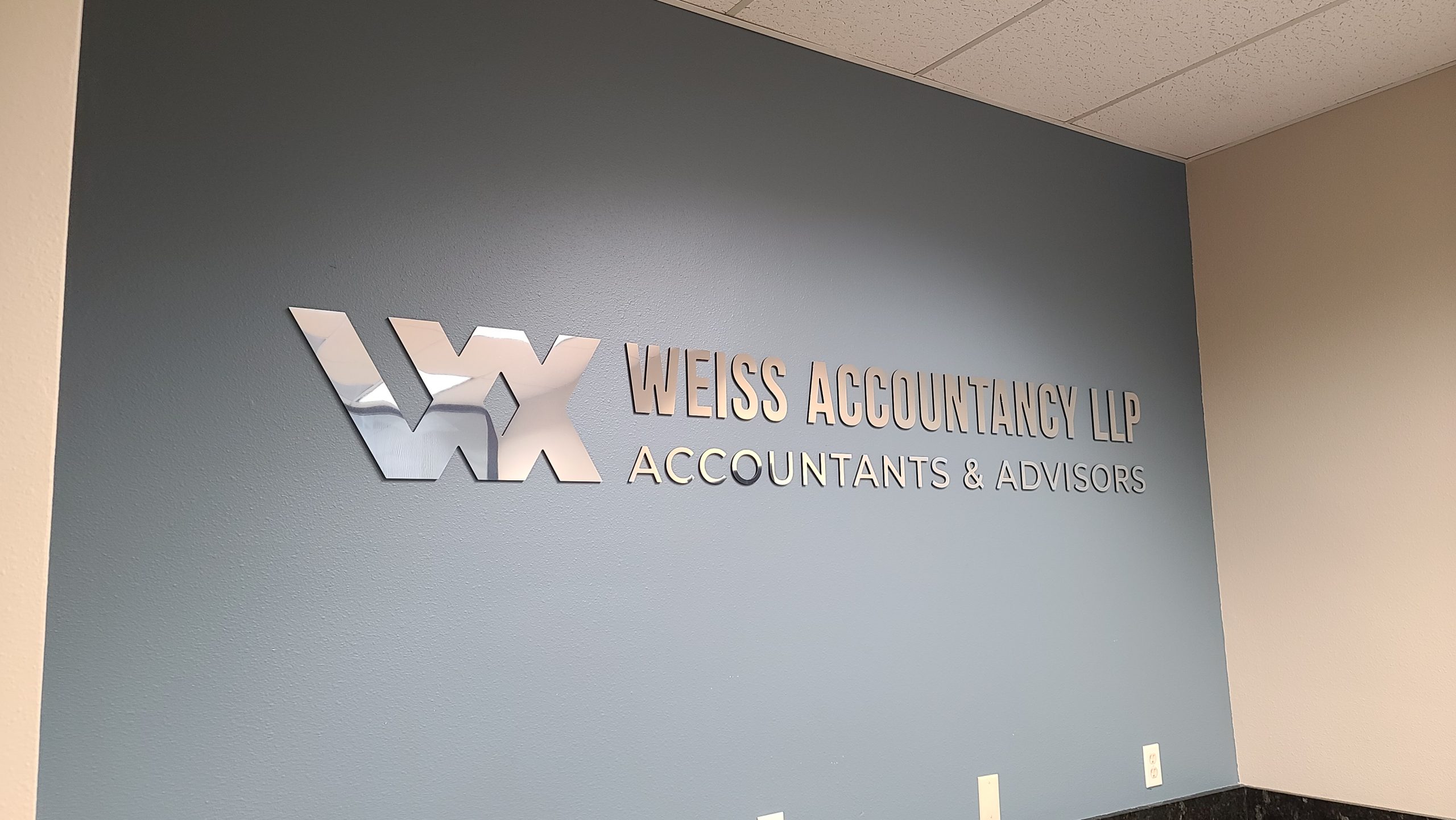 This is the conference room sign package we fabricated and installed for Weiss Accountancy's Van Nuys office.