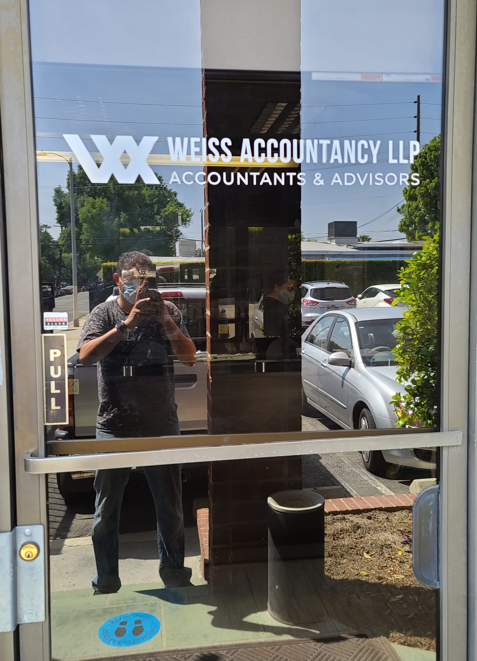 More signs made and installed for Weiss Accountancy. This time it is a window graphic business sign package that thoroughly decorates their Van Nuys office.