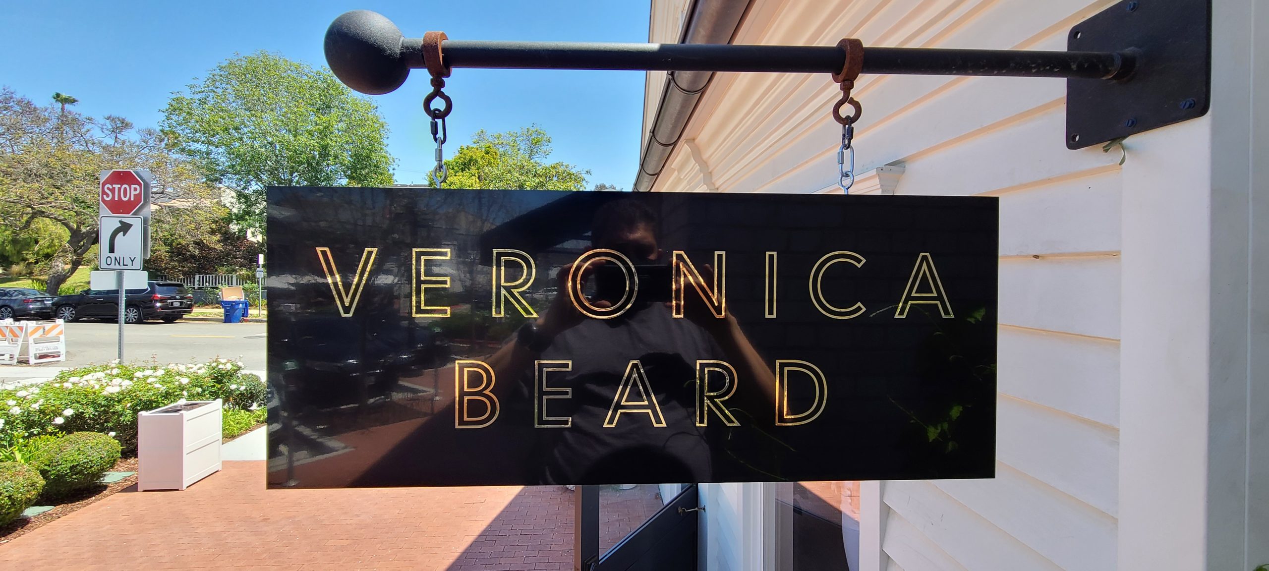 With more shoppers going out and about, captivating signage is a must. Like these blade signs for Veronica Beard in Pacific Palisades.