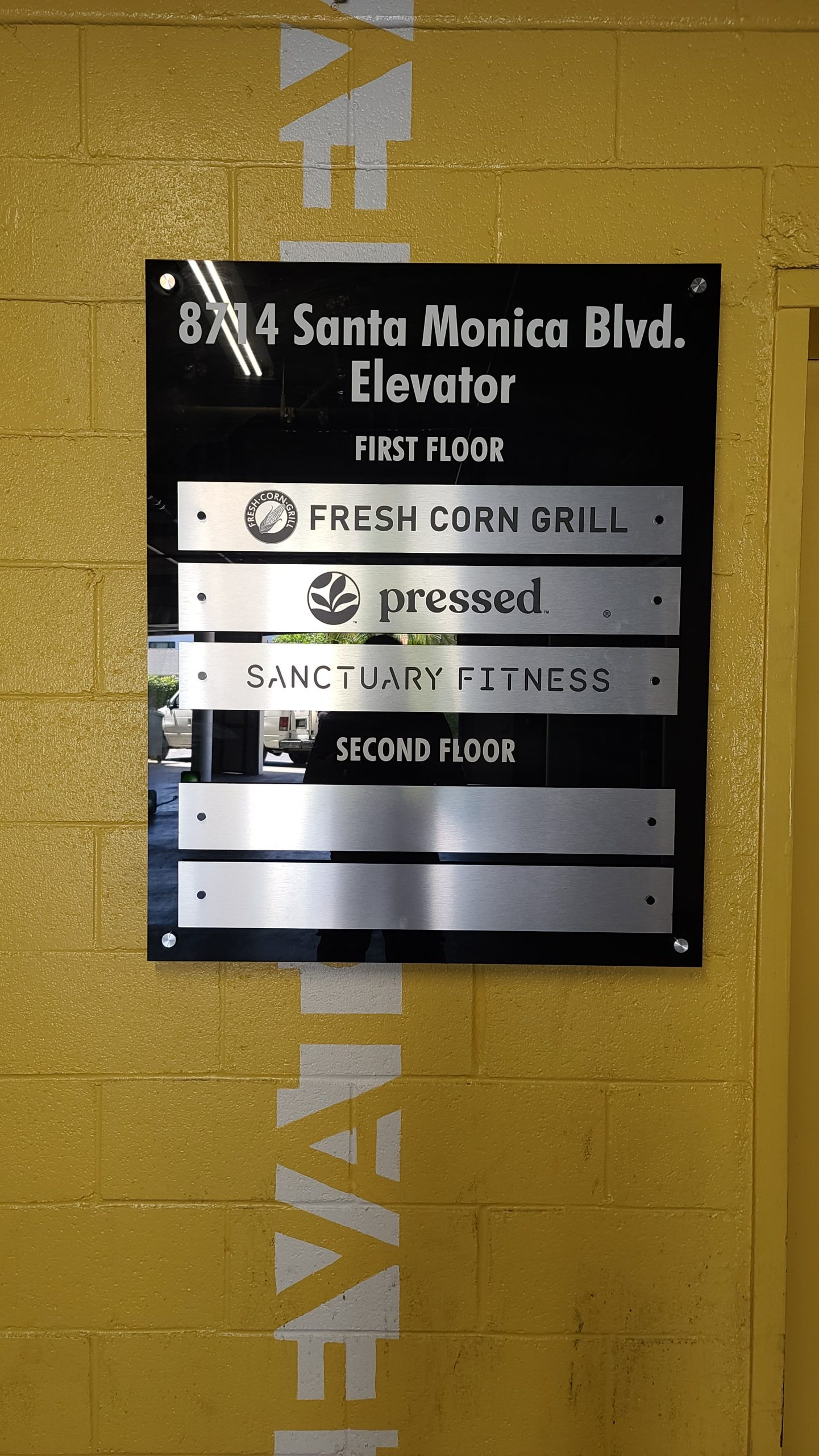 More from our sign package for Ronco Investments Inc. We fabricated and installed these basement directory signs in their Beverly Hills building.
