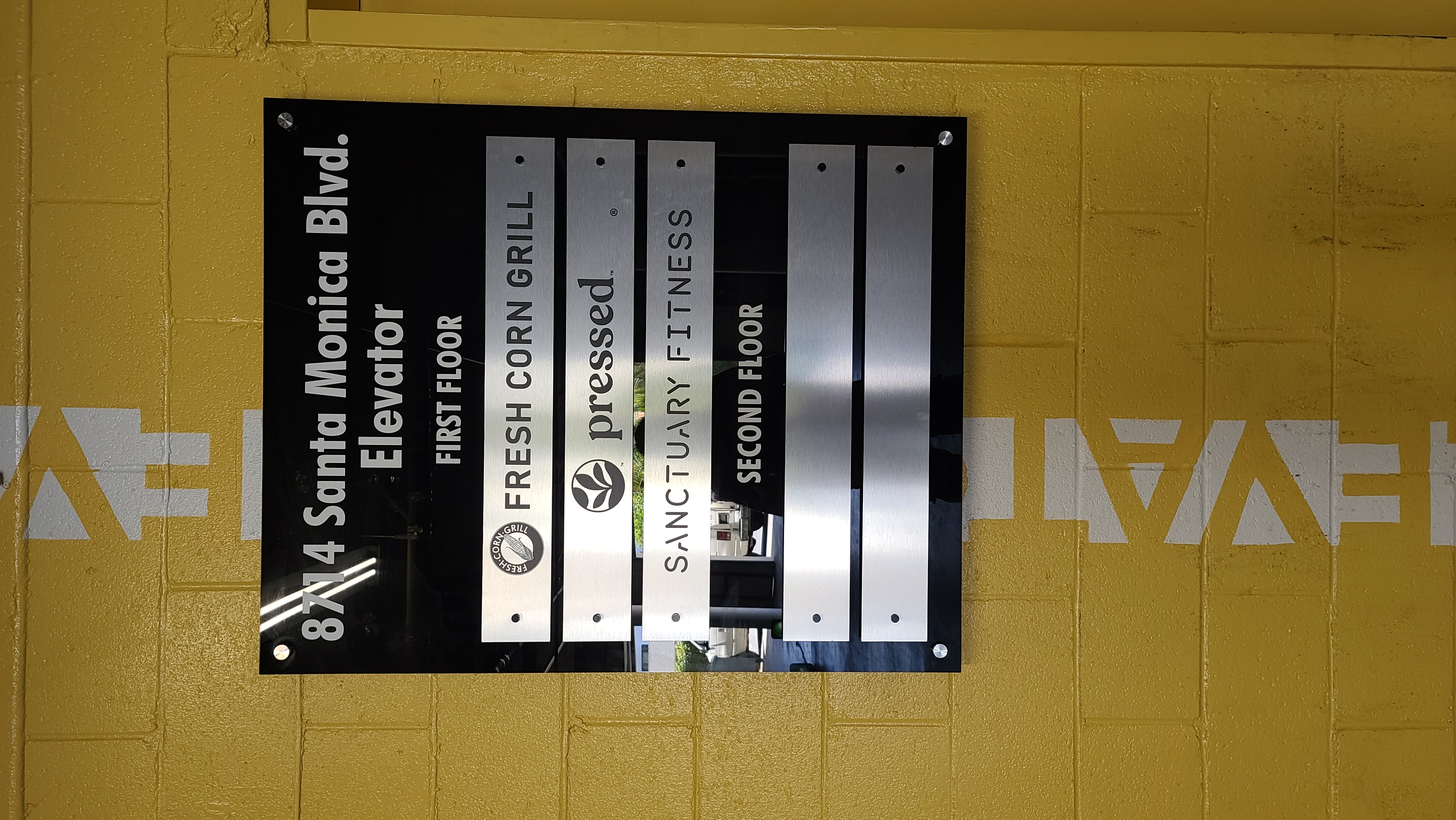 More from our sign package for Ronco Investments Inc. We fabricated and installed these basement directory signs in their Beverly Hills building.