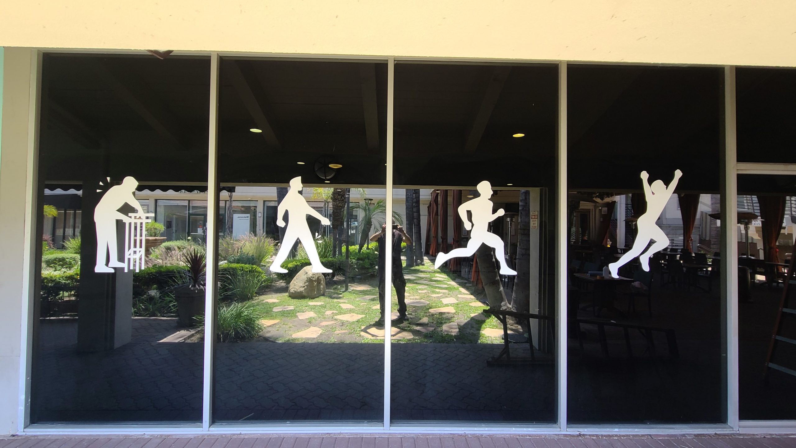 Building window graphics for Back 2 Health in Encino, as part of a comprehensive sign package for the physical therapy center. 
