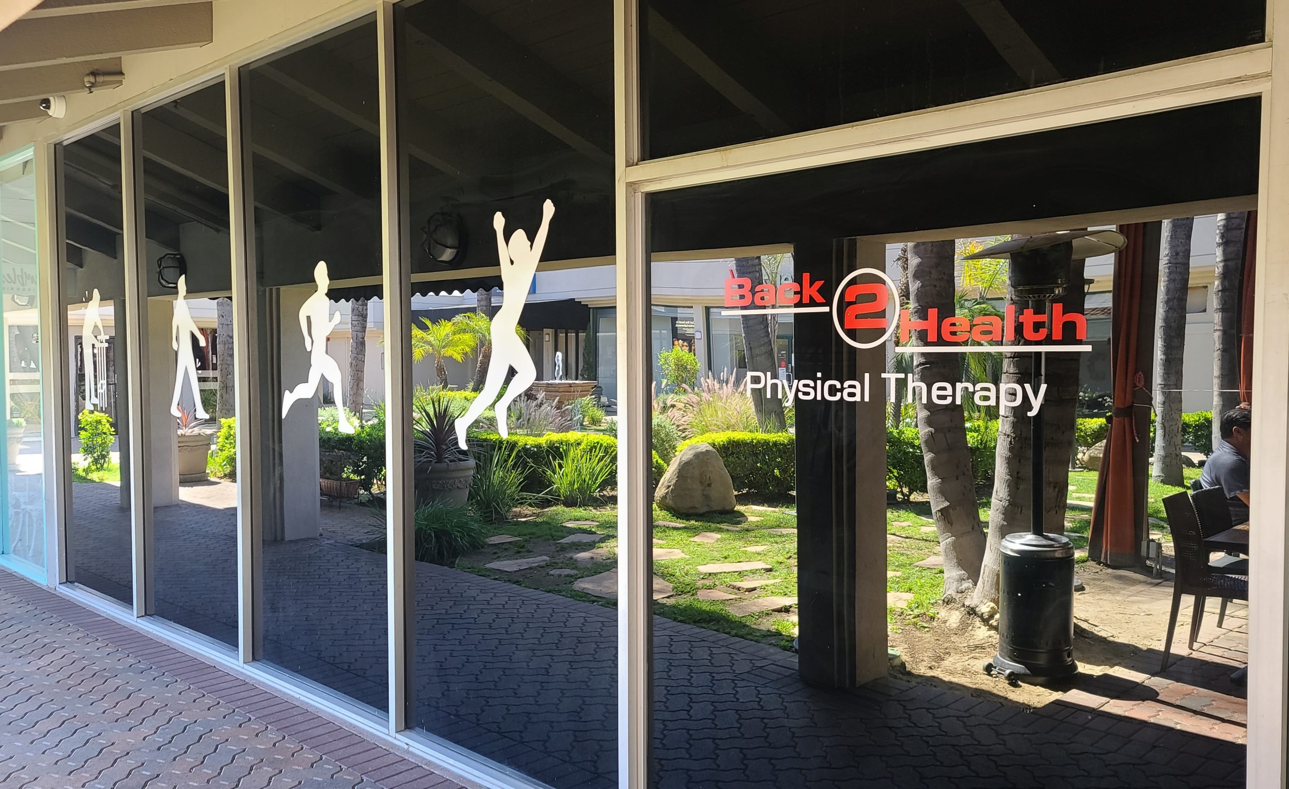 You are currently viewing Building Window Graphics for Back 2 Health in Encino