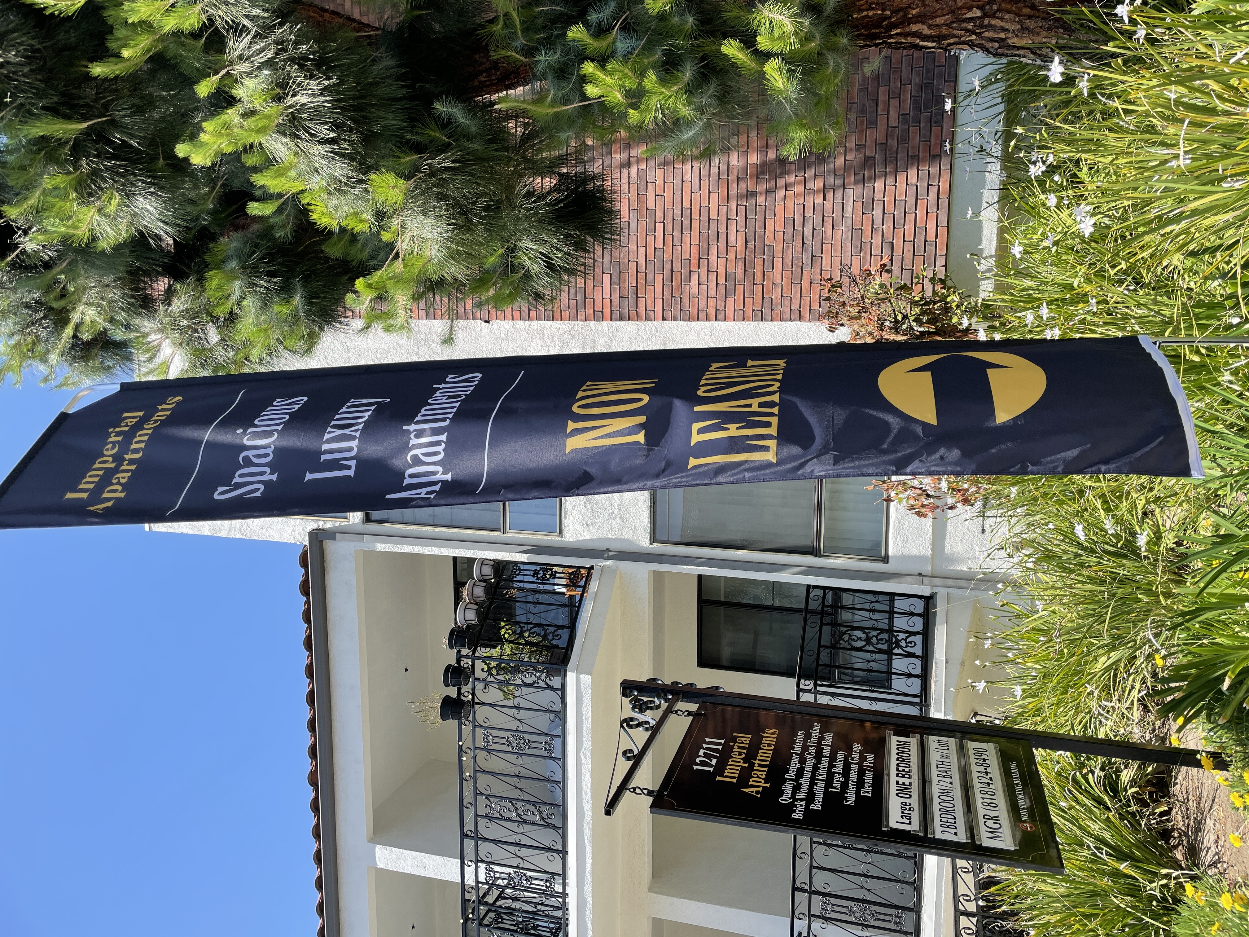 Real estate firms can reach customers better with advertisement banners detailing their properties. Like our signs for Imperial Apartments in Studio Cities.