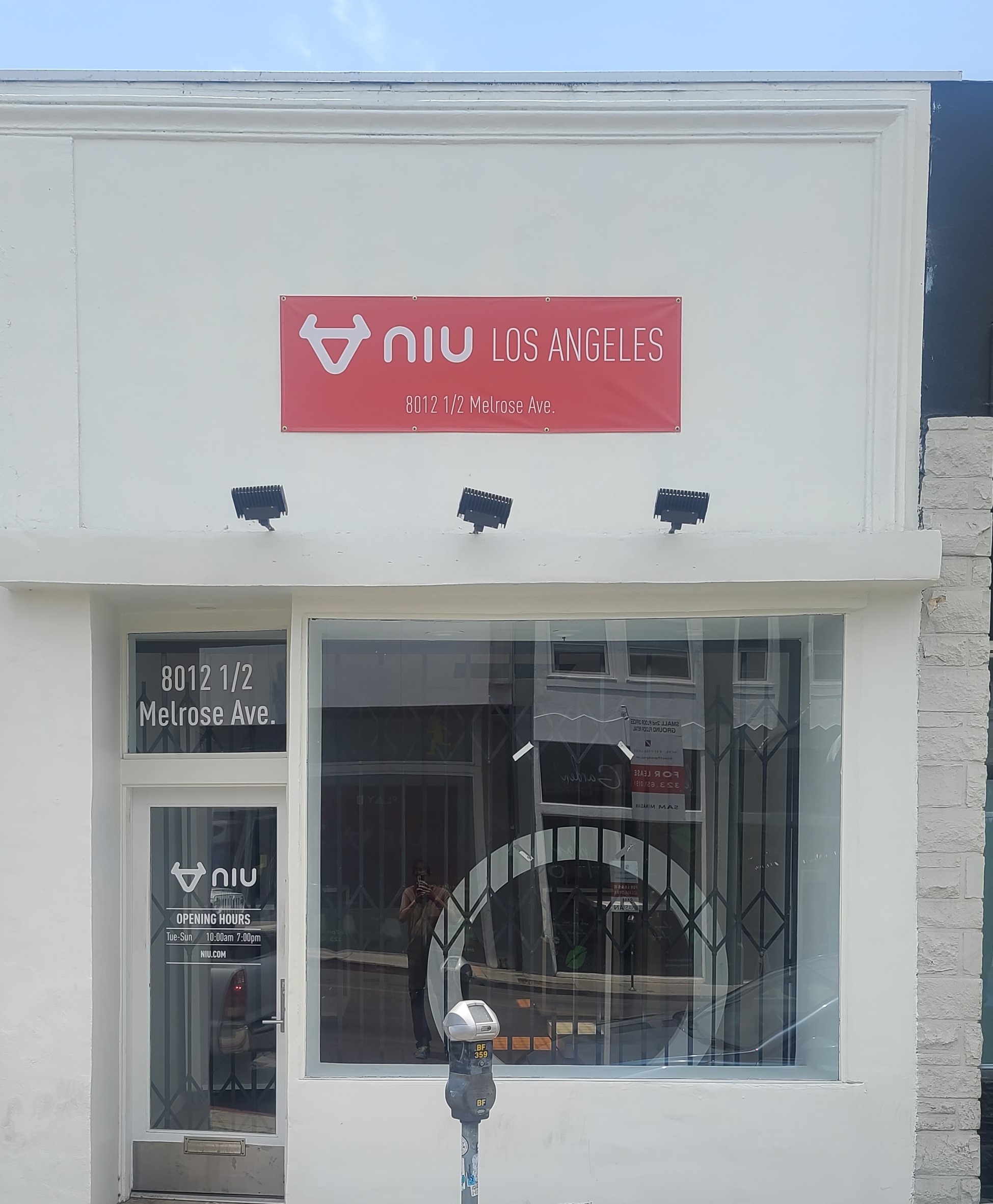 Part of a sign package, this storefront banner gives NIU's Los Angeles branch more visibility before more permanent signage is installed.