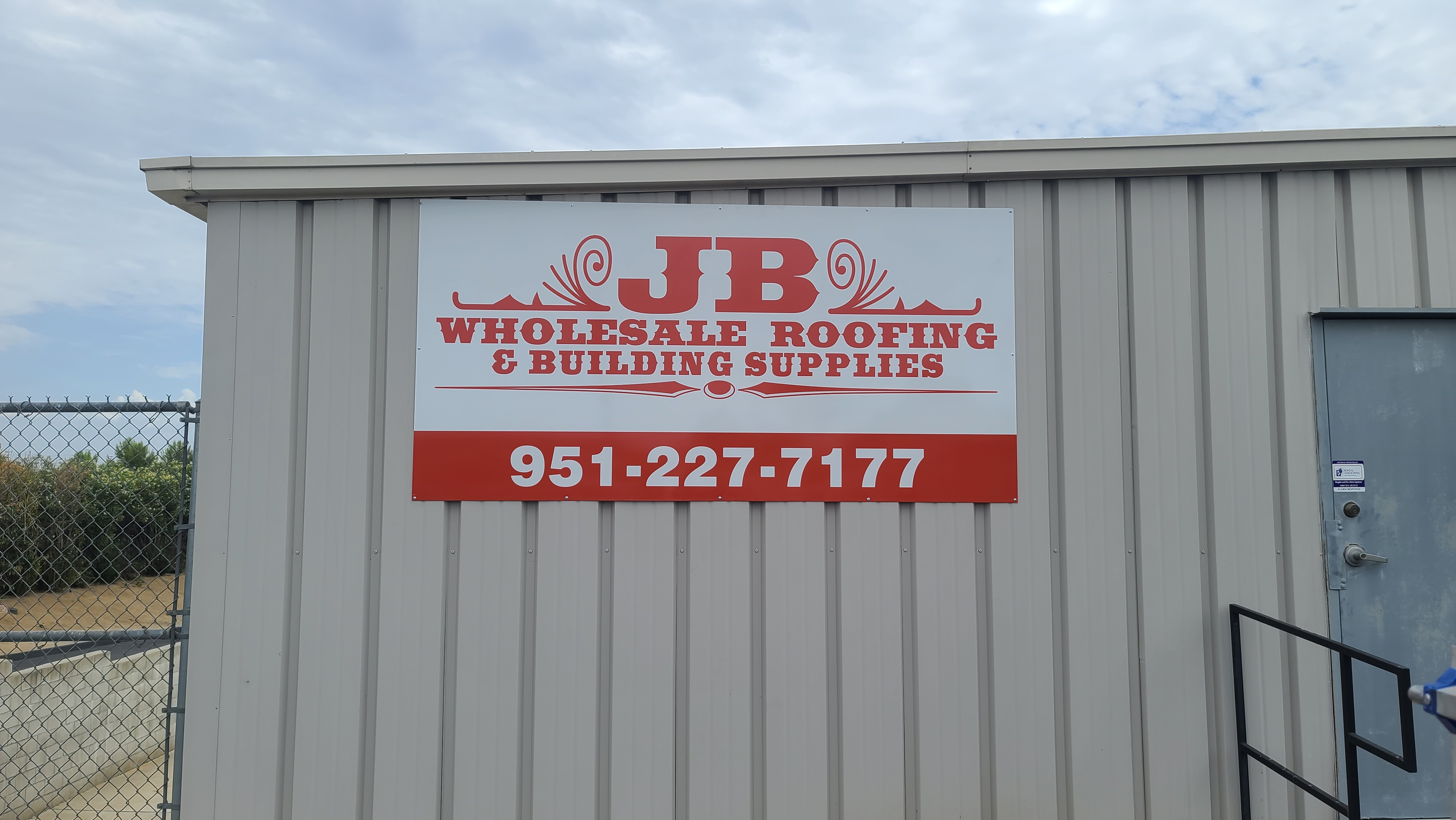 This metal panel sign for JB Wholesale Roofing's parking lot in Murietta features their logo and contact details, giving their brand more visibility.
