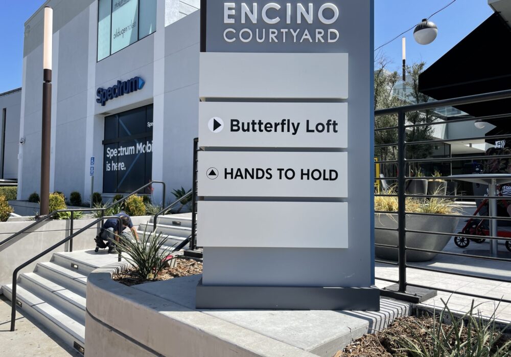 Outdoor Wayfinding Signs for Hands to Hold in Encino Courtyard