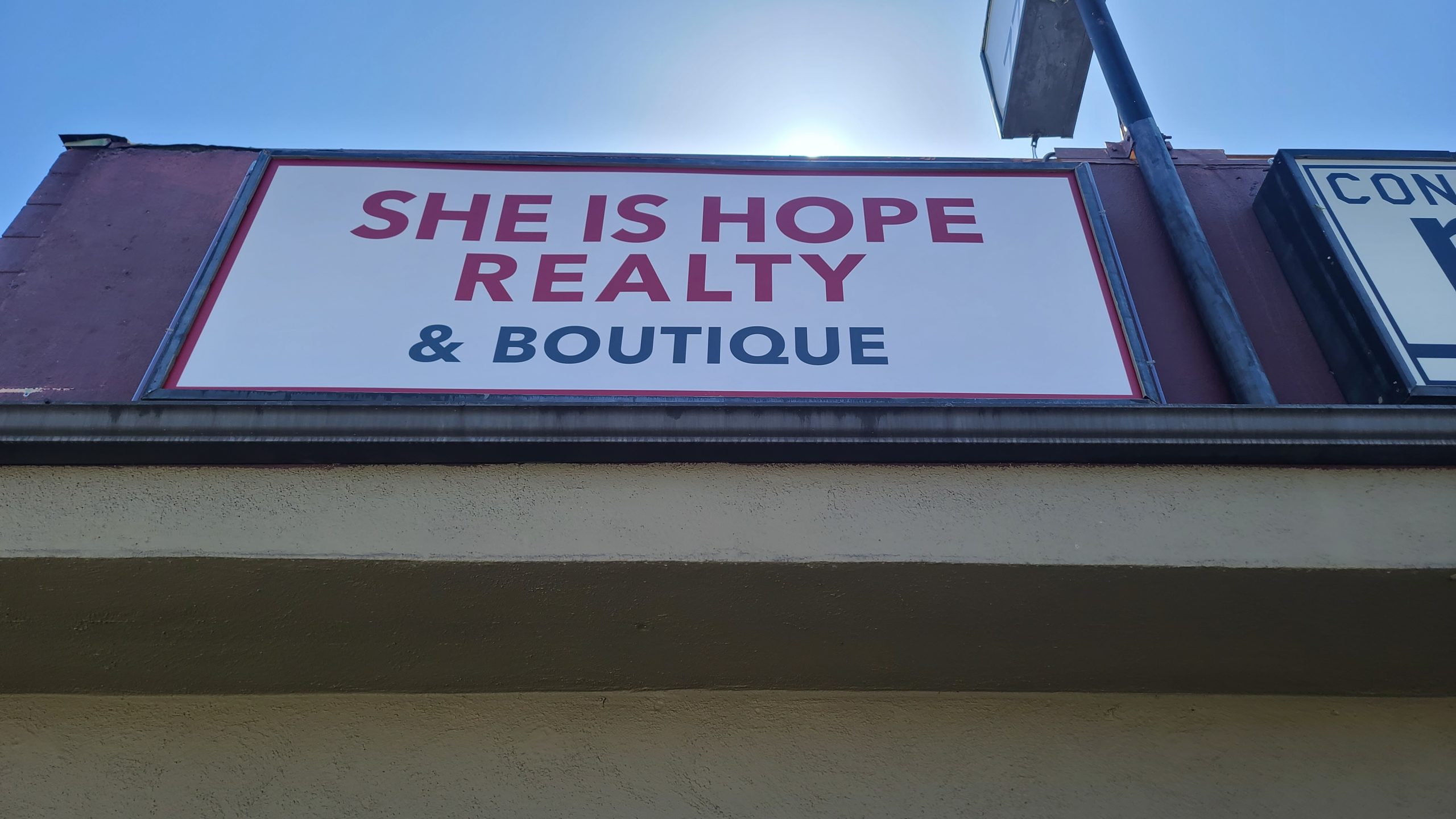 These lightbox inserts are part of storefront design package for She is Hope Realty & Boutique in Encino.
