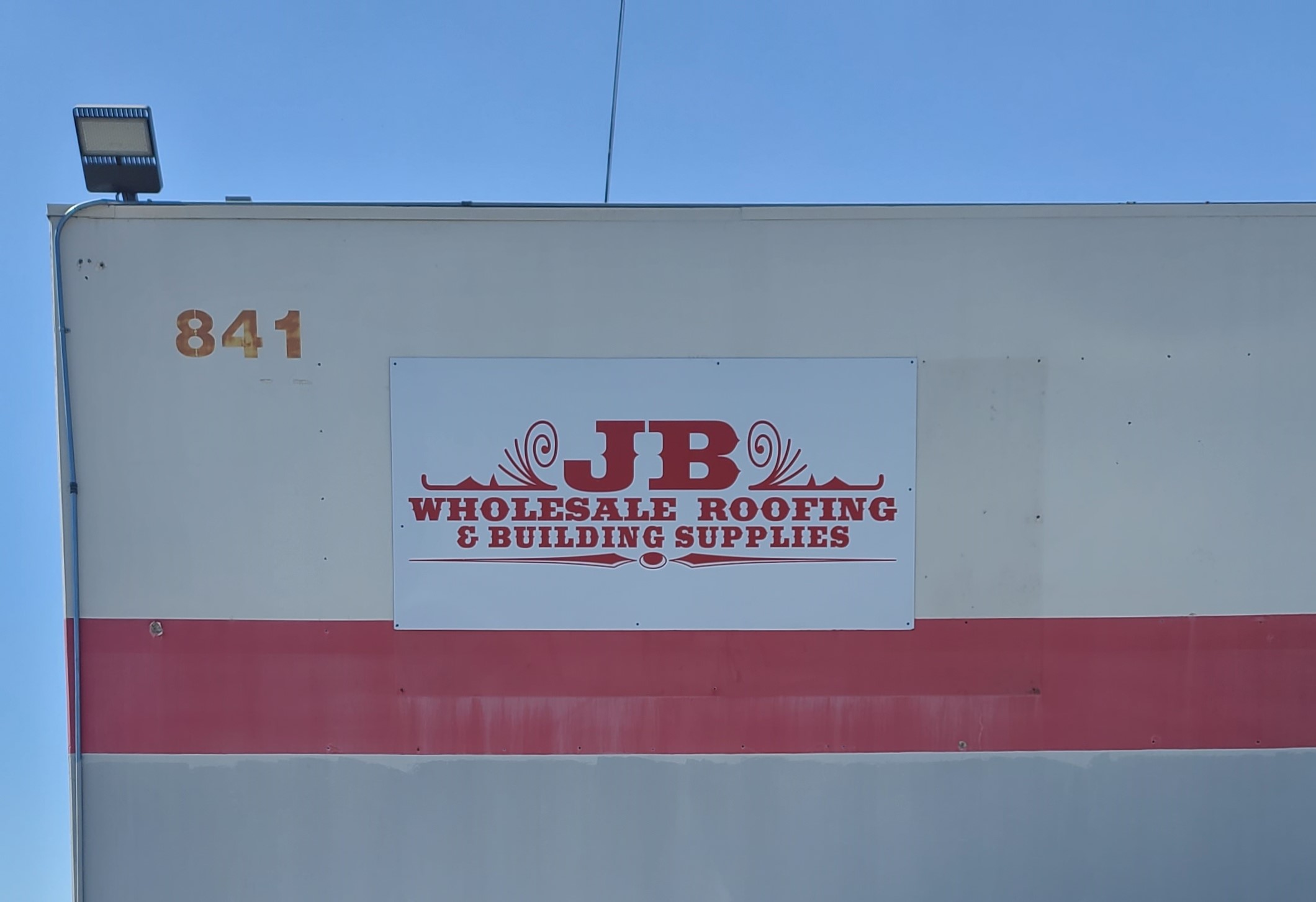 Our sign package for JB Wholesale includes more maxmetal outdoor signs for their Riverside branch. These include a building sign and directional pole signs.