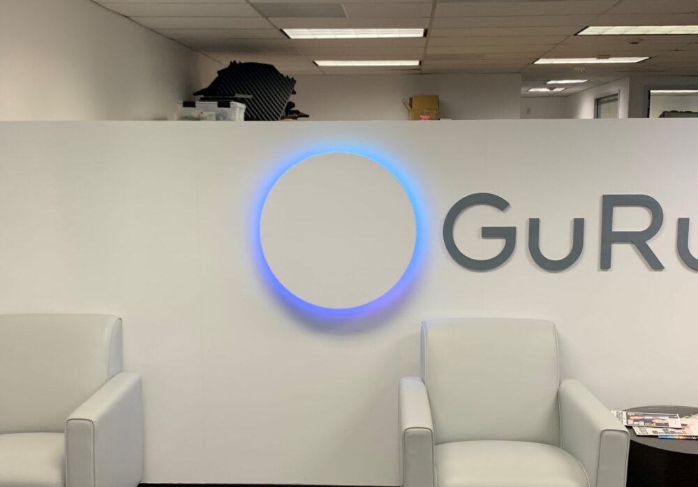 Wall Wrap and Sign Relocation for Guru Wireless in Pasadena
