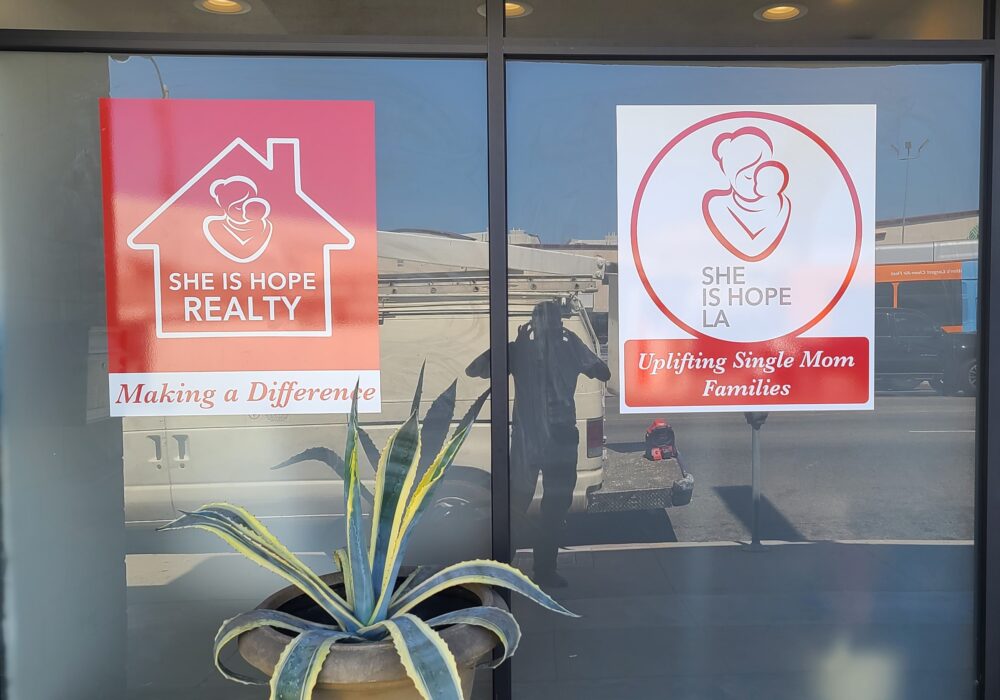 She is Hope Realty & Boutique Window Graphics in Encino