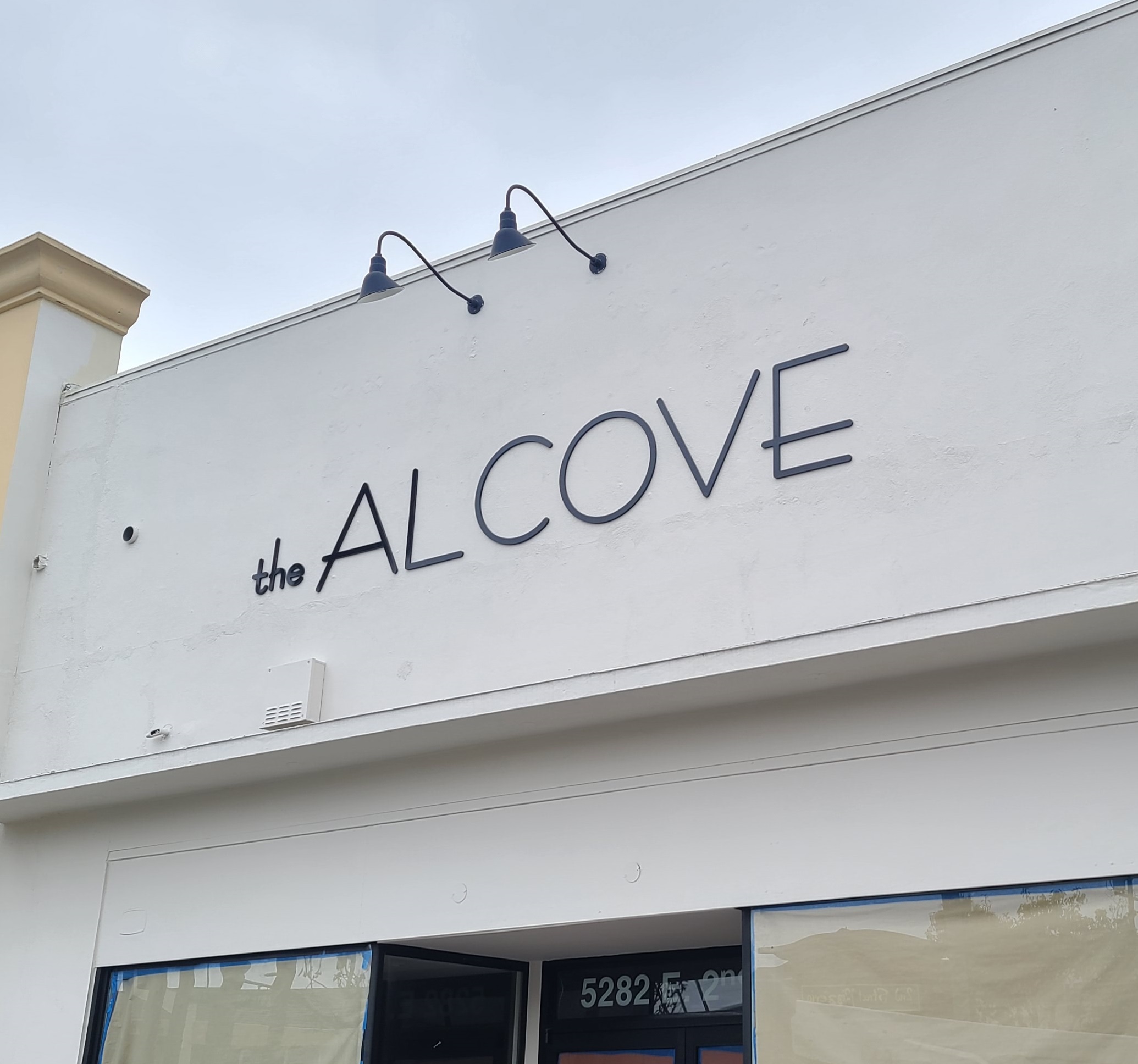 Fashion stores need fitting signage, like this storefront sign for our friends at The Alcove's new branch.