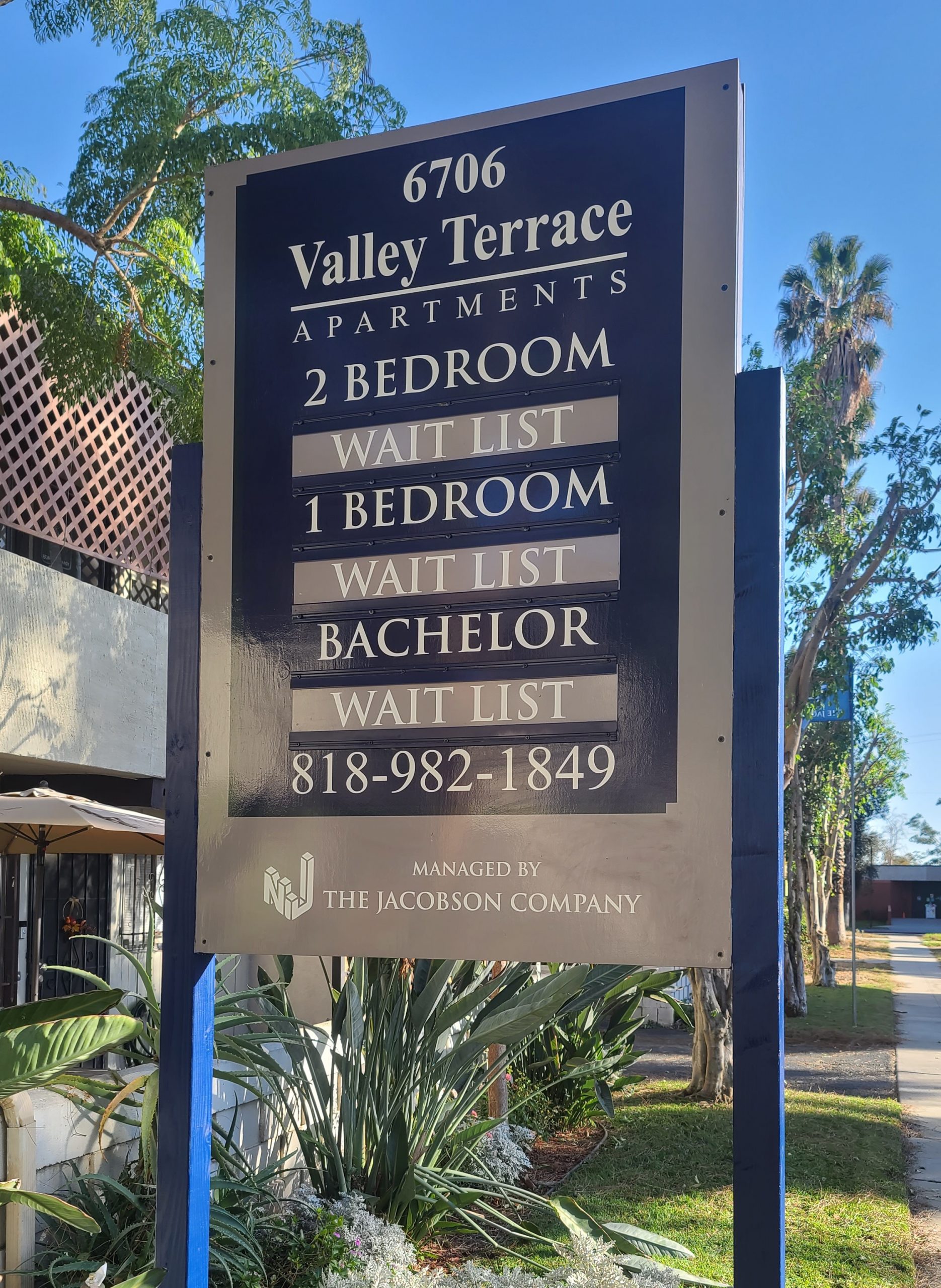 The apartment post and panel sign for The Jacobson Company's North Hollywood property. With this they can get more eyes on the real-estate they are offering.