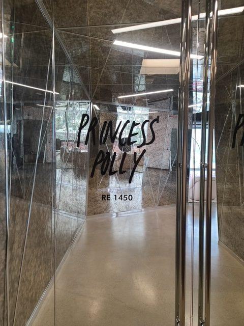 The glass door graphics we installed for the entrance of Princess Polly's West Hollywood store. Entrance signs are a great way to entice potential customers.