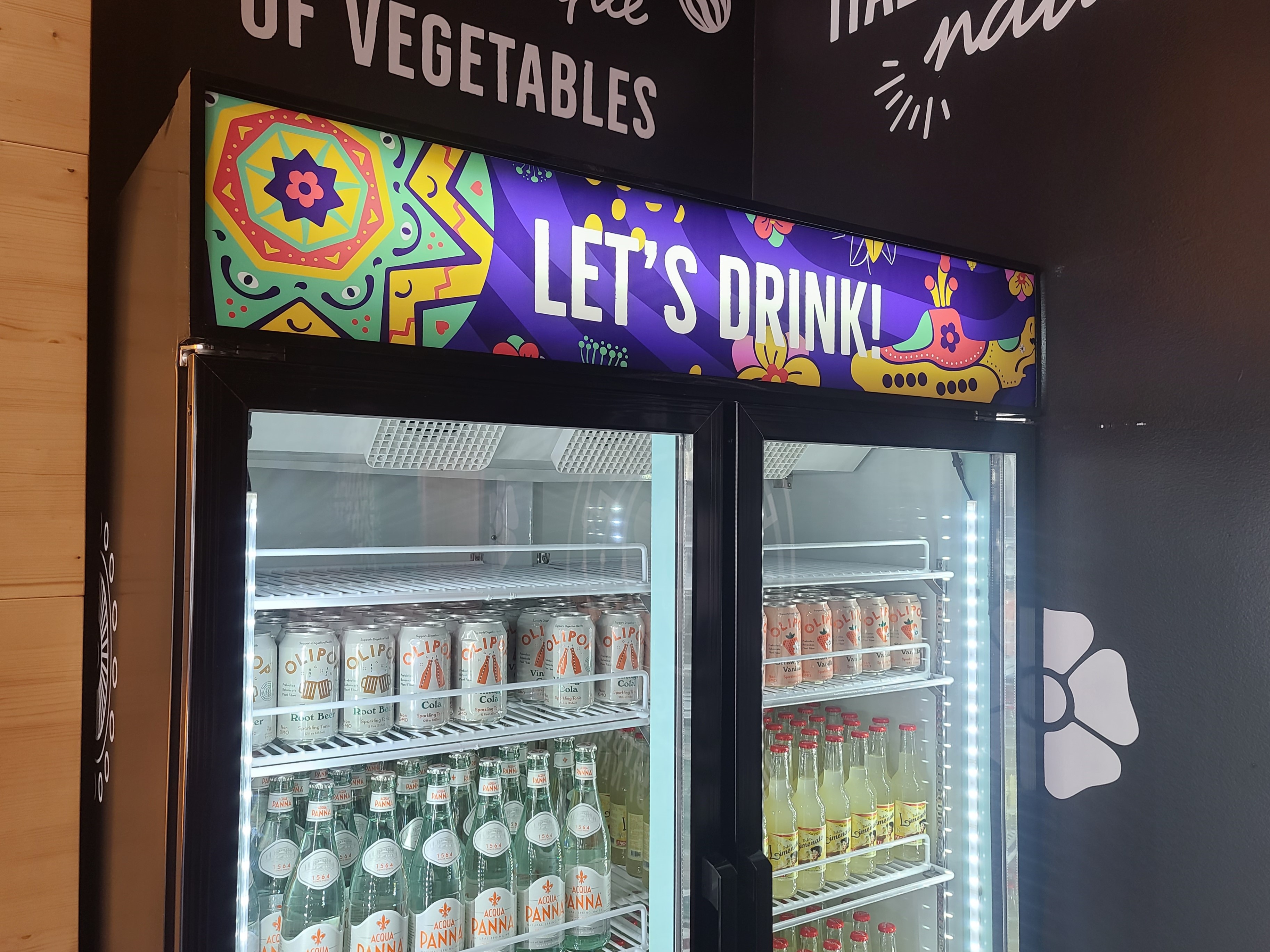 Lightbox inserts can work on refrigerators as well! These are great for pizzazz and advertising, like this merchandising sign for Flower Burger in Melrose.