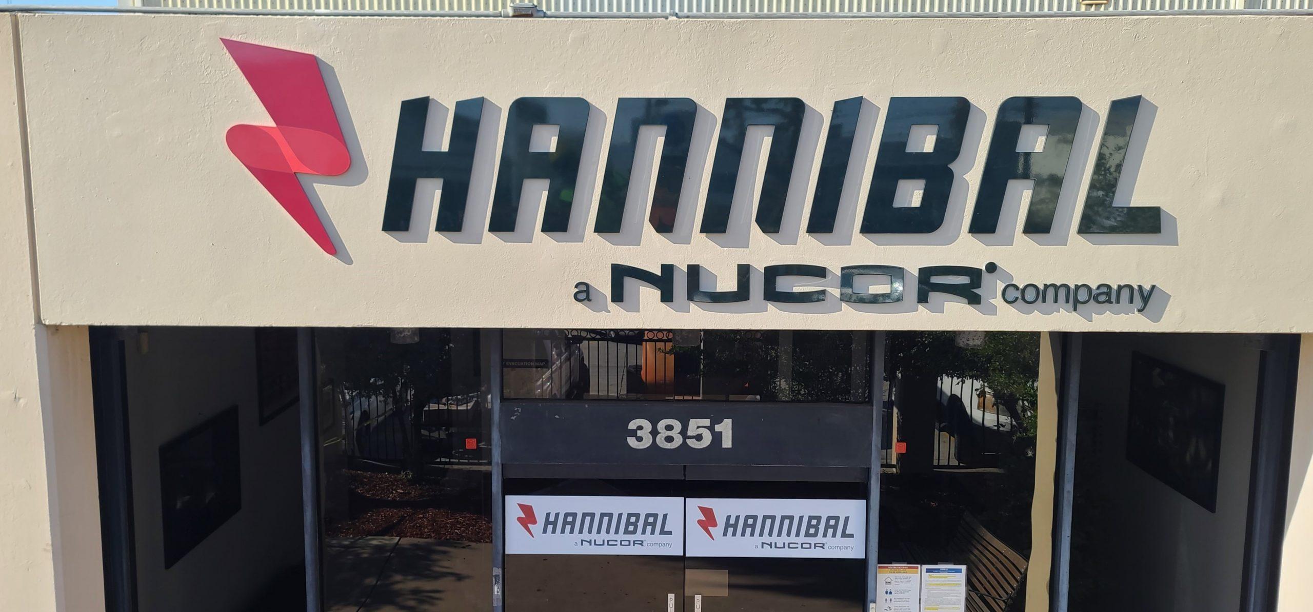 Our sign package for Hannibal Nucor continues with this set of acrylic letters and glass door graphics entrance signs for their Vernon office.