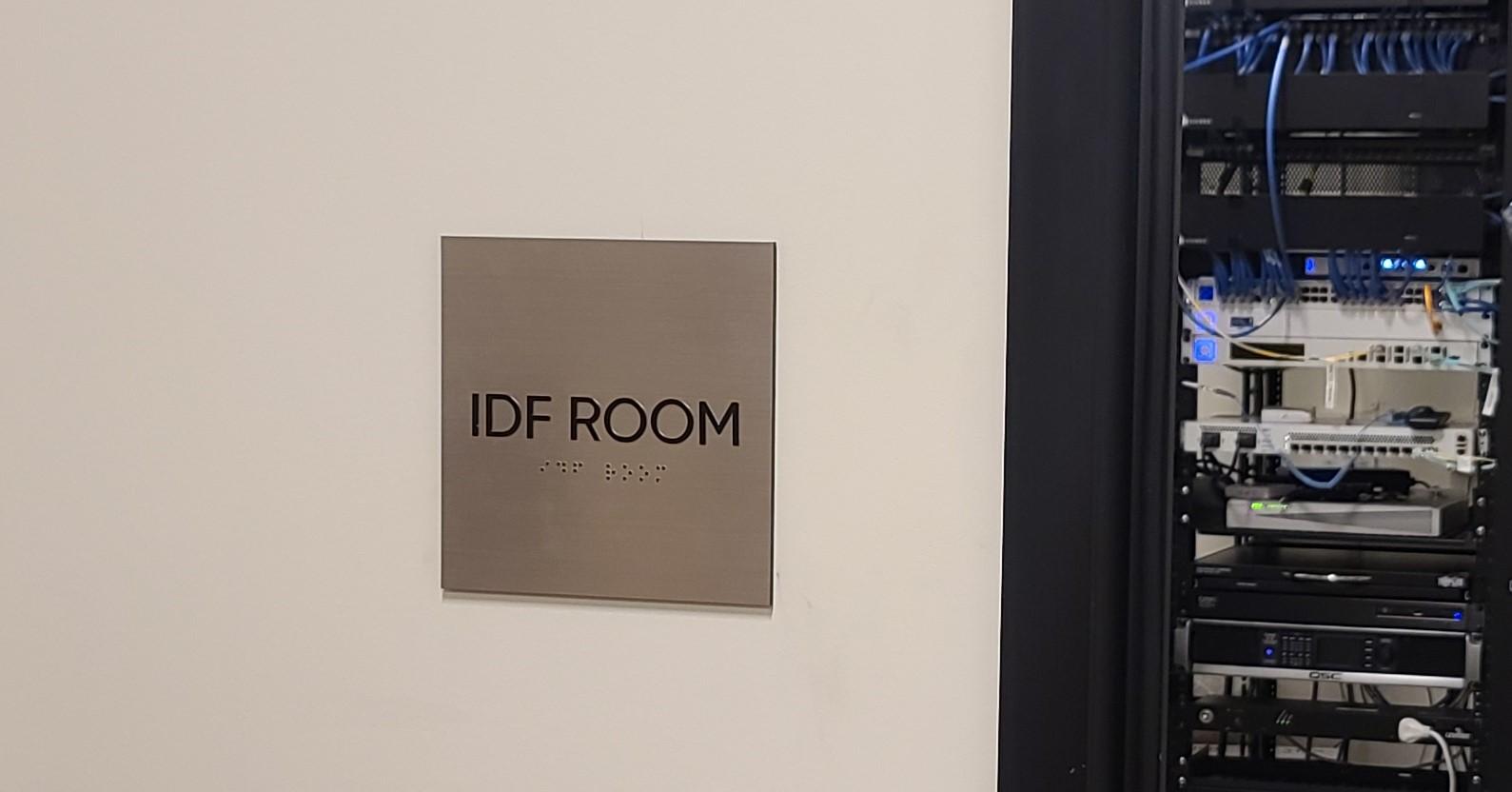 ADA sign with braille. These ADA directional signs with braille for Simple Practice will enhance their Santa Monica office by providing visual and tactile displays outlining various areas such as their IDF and copy rooms.