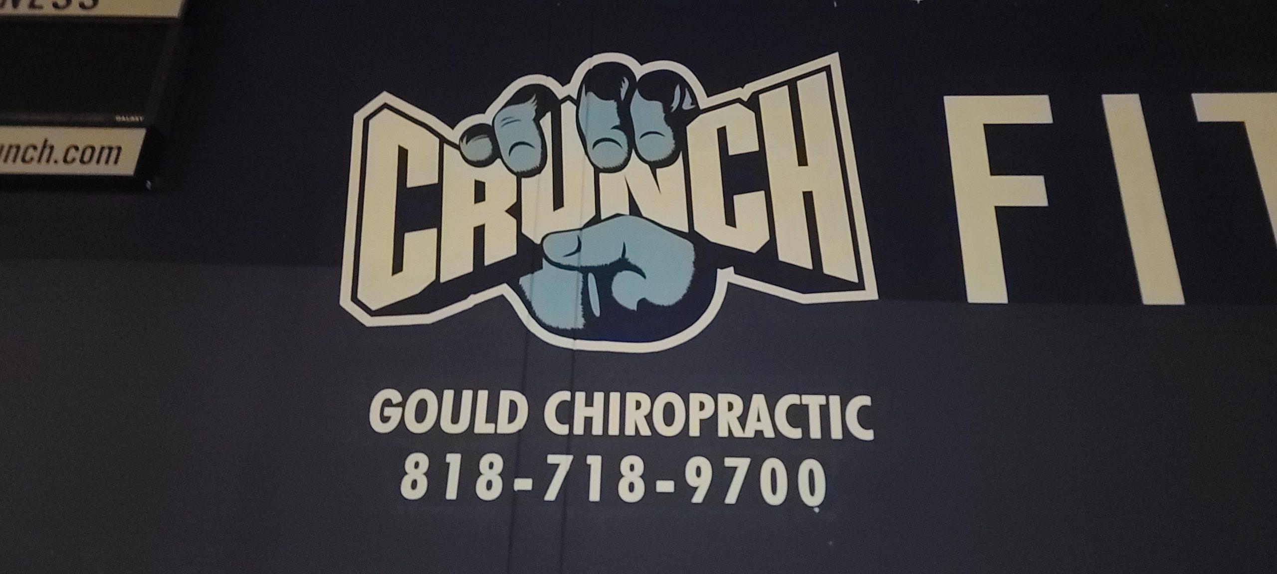 Gym signs encourage clients working on their New Year's resolutions. Like this hand painted sign for Crunch Fitness Chatsworth highlighting chiropractic care.